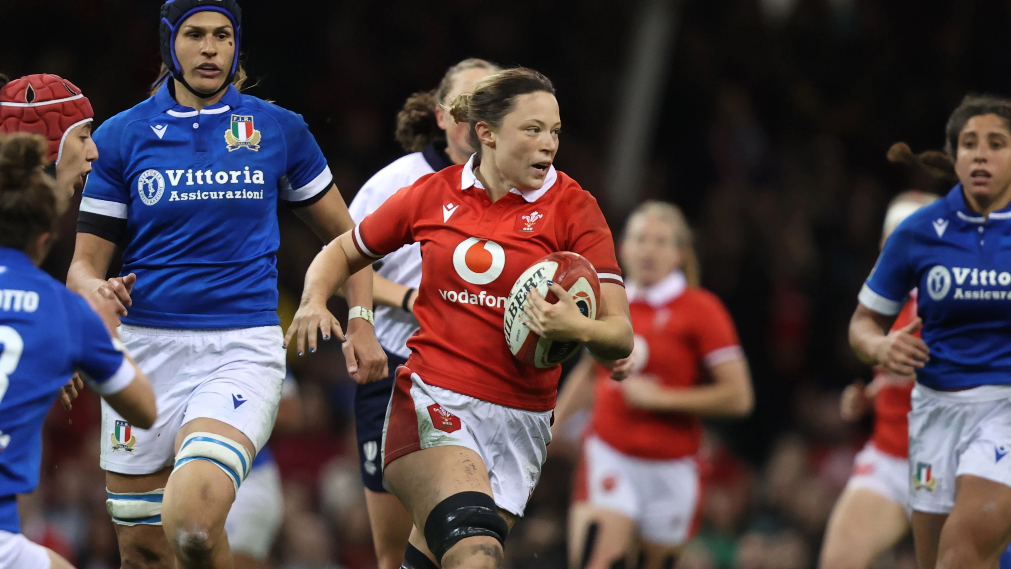 Wales Alisha Butchers makes a break during the 2024 Guinness Women's Six Nations Championship Round 5 between Wales and Italy in Principality Stadium