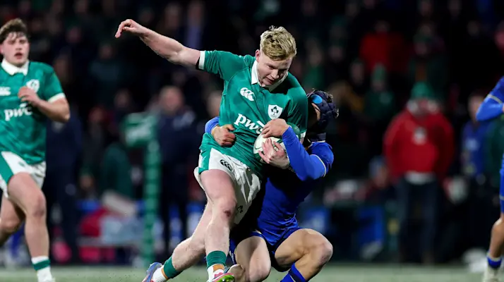 Ireland's Robert Carney is tackled by Edoardo Vitale of Italy during the 2026 Under 20 Six Nations match in Virgin Media Park, Cork.