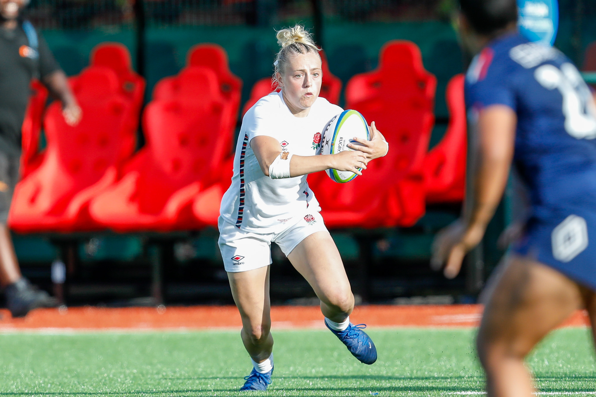 England's Millie David on the run during a 2025 Women's Summer Series match in Caerphilly.