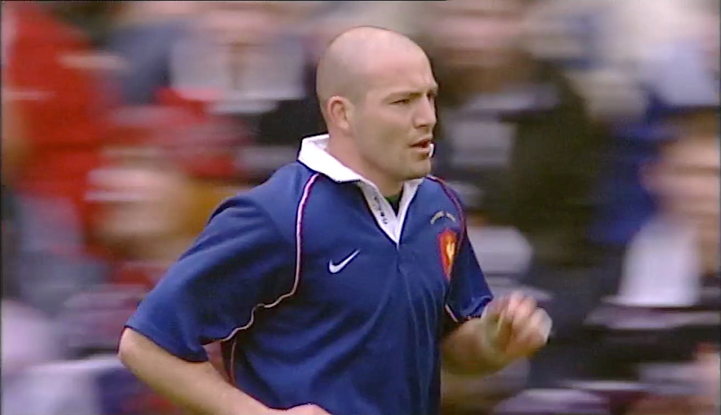 France fly-half Gerald Merceron runs back from taking a successful conversion against Scotland in the 2002 Championship.