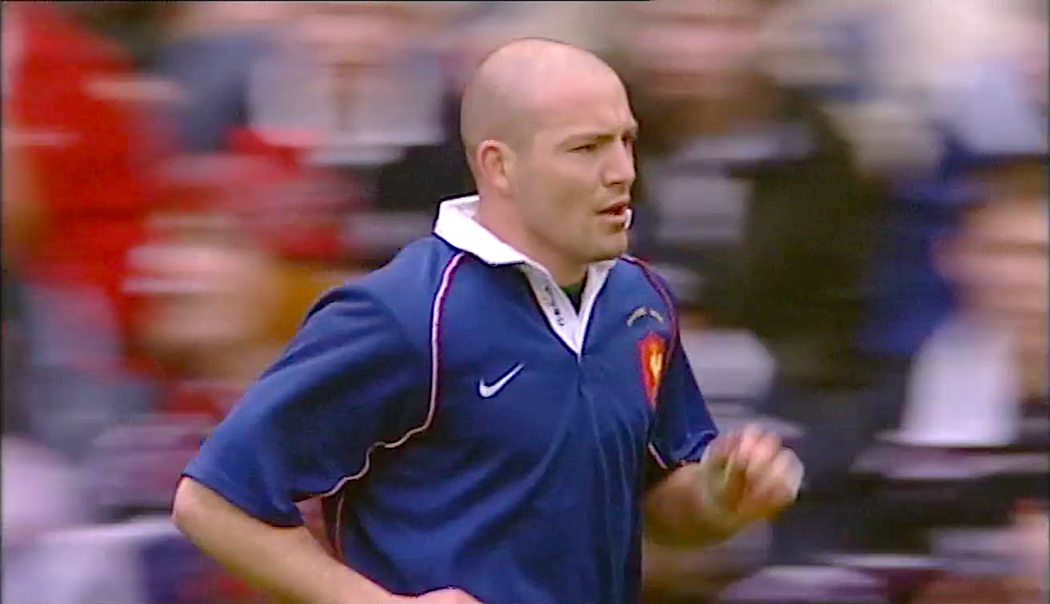 France fly-half Gerald Merceron runs back from taking a successful conversion against Scotland in the 2002 Championship.