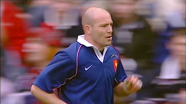 France fly-half Gerald Merceron runs back from taking a successful conversion against Scotland in the 2002 Championship.