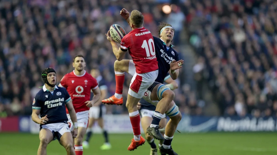 Wales' Gareth Anscombe and Scotland's Jamie Ritchie vie for the high ball during the 2025 Six Nations Championship