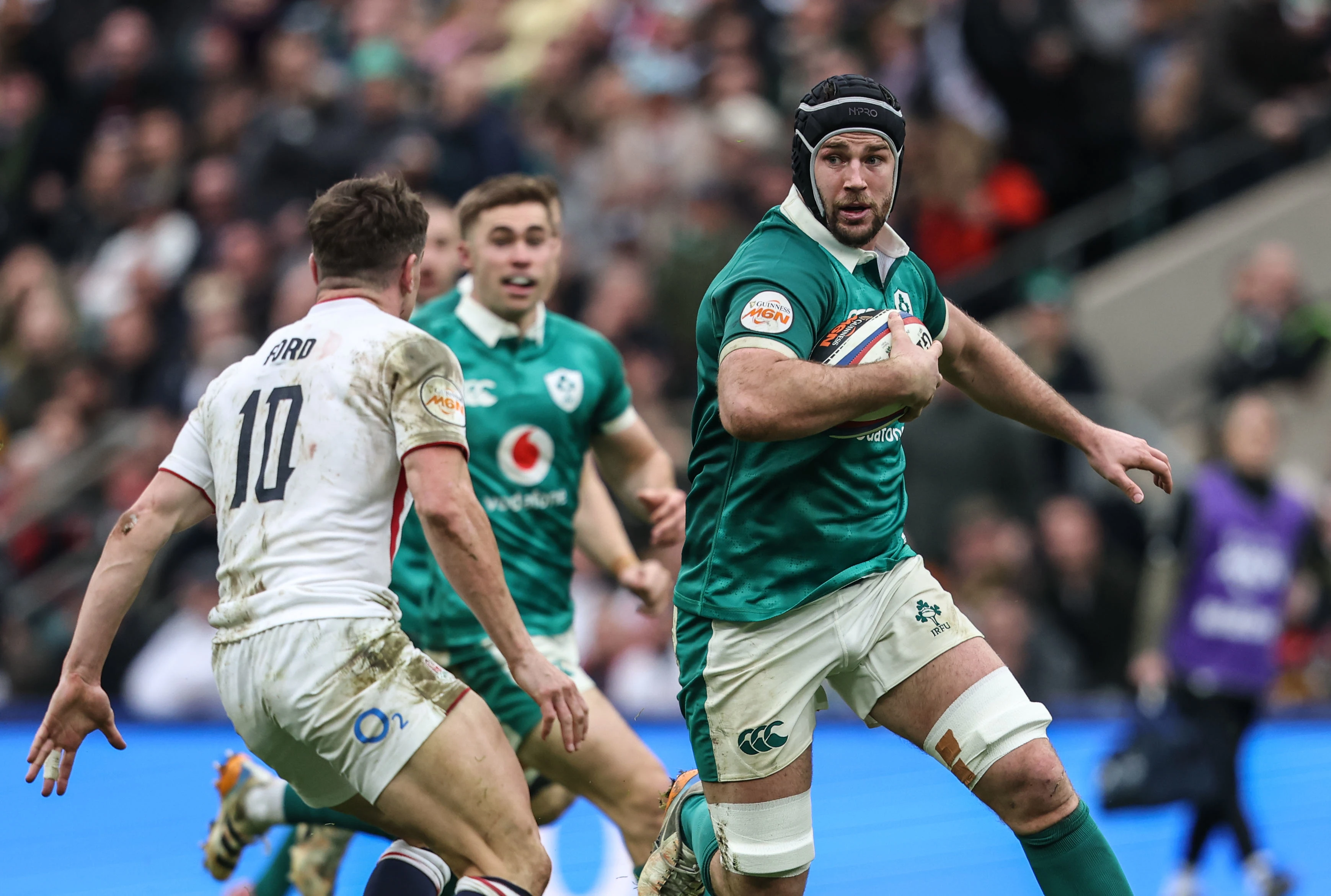 Ireland's Caelan Doris looks to carry the ball into England's George Ford during the 2026 Championship match in Twickenham.