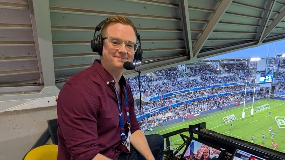 An image of Nick Heath in the commentary box.
