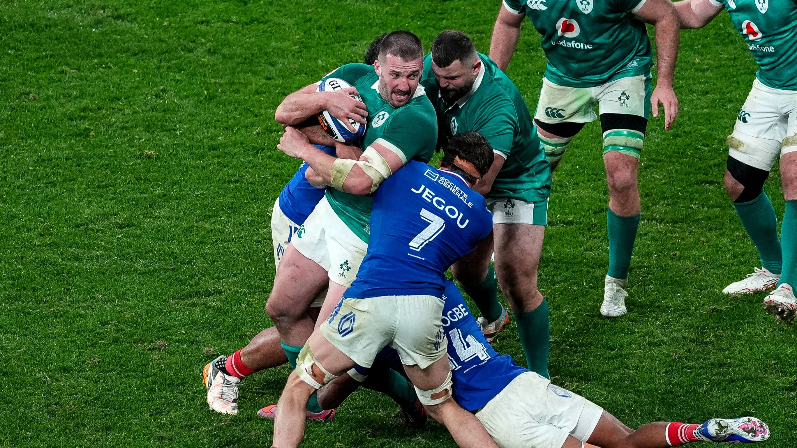 Ireland's Stuart McCloskey is tackled by France’s Oscar Jegou during the 2026 Guinness Six Nations Championship Round 1 game between France and Ireland in Stade de France, Paris