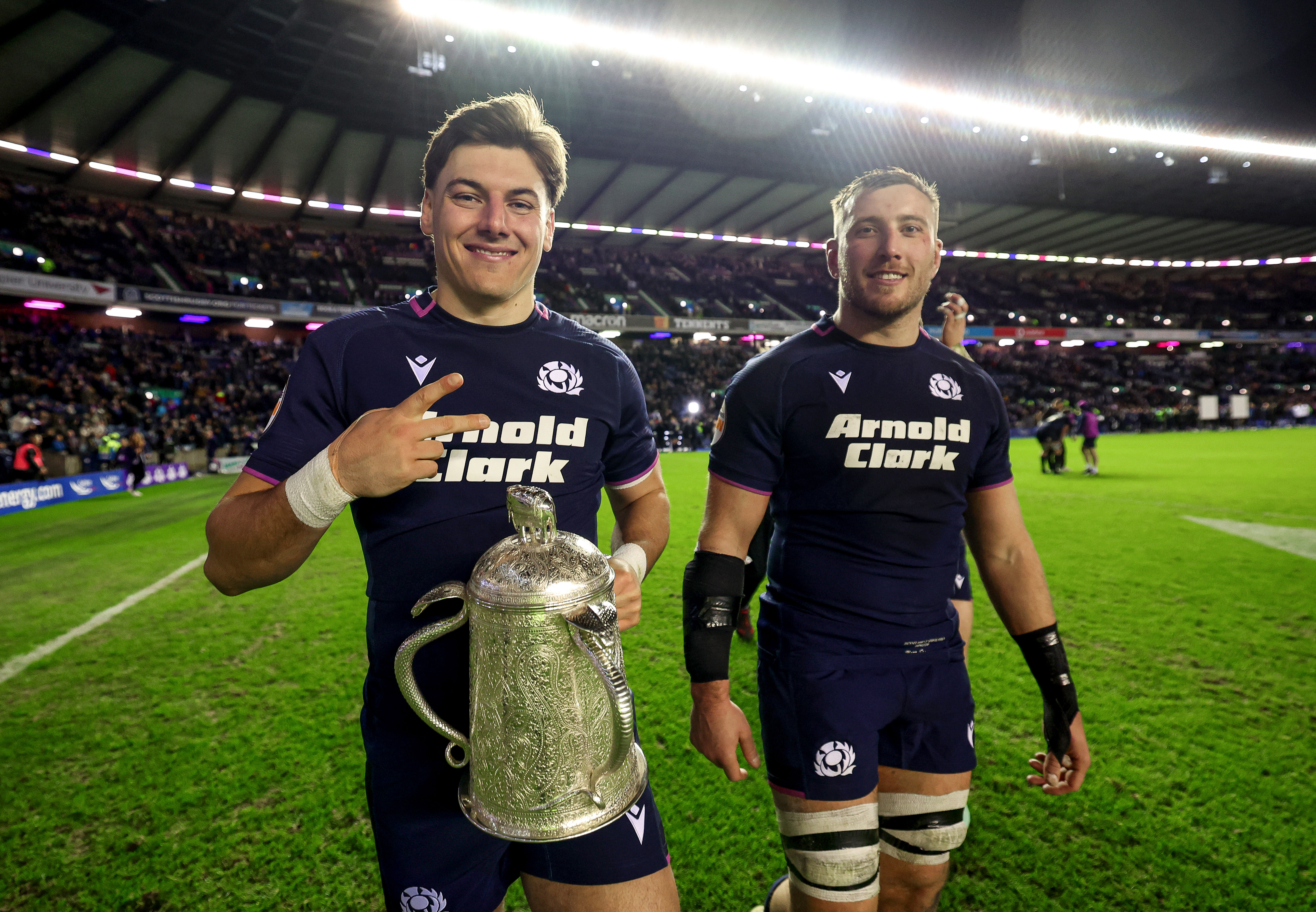 Scotland's Tom Jordan and Matt Fagerson celebrate with the Calcutta Cup after their 2026 win at Murrayfield.