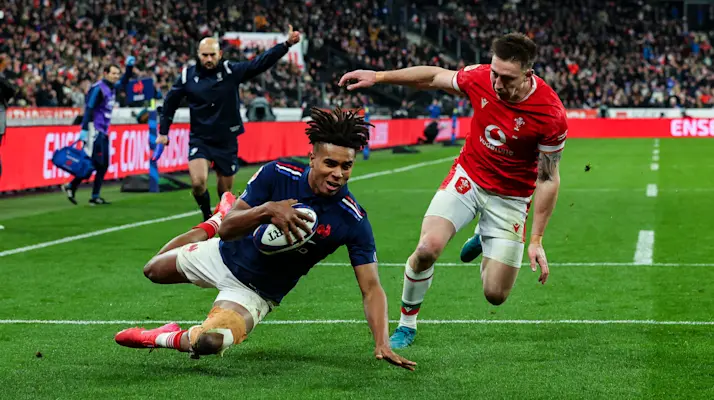 2025 Guinness Six Nations Championship Round 1, Stade de France, Paris, France 31/1/2025
France vs Wales
France's Theฬo Attissogbe scores their first try despite Josh Adams of Wales
Mandatory Credit ยฉINPHO/Manuel Blondeau