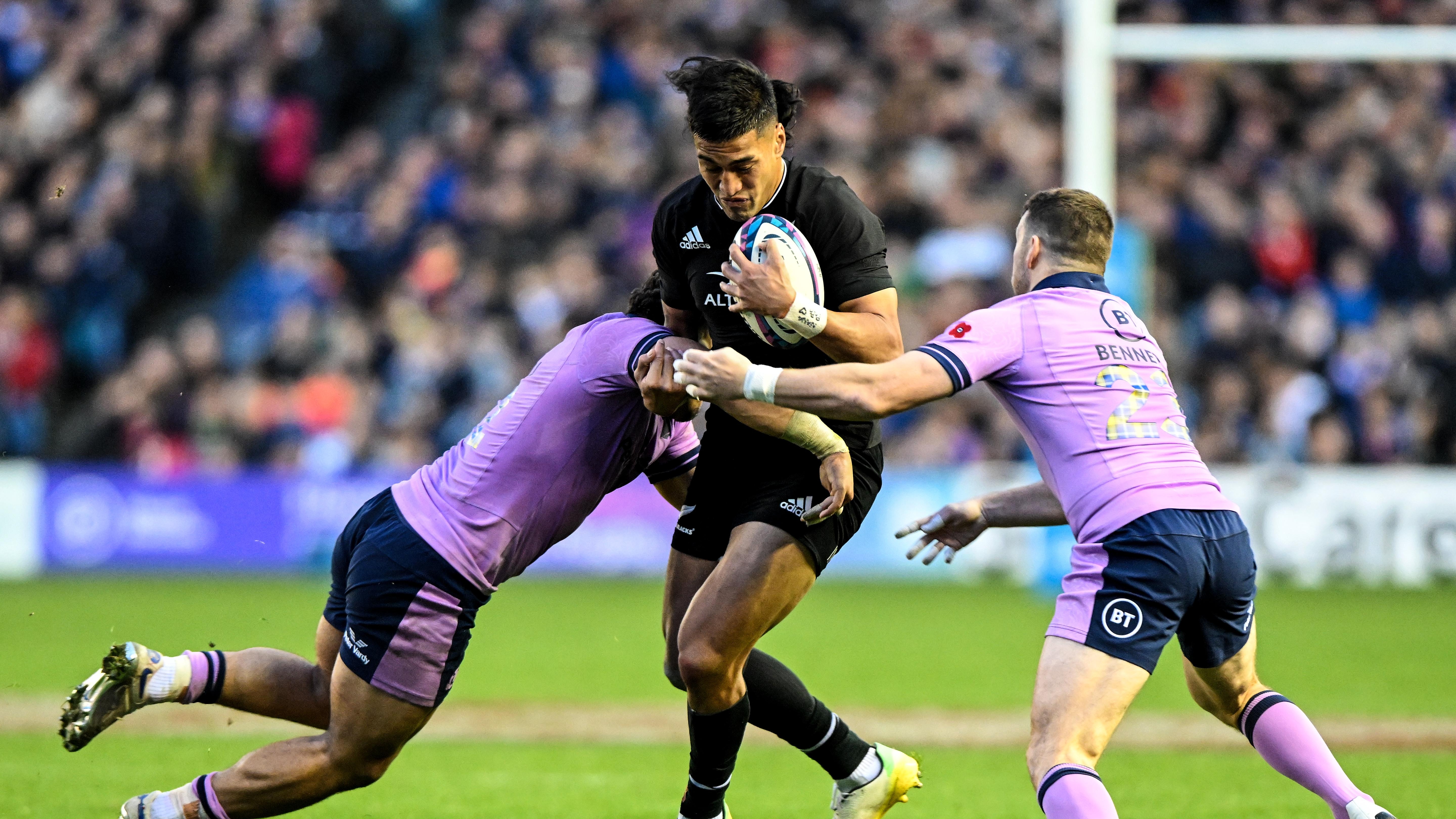 All Blacks' Rieko Ioane looks to burst through the Scottish defence in Edinburgh in 2022.