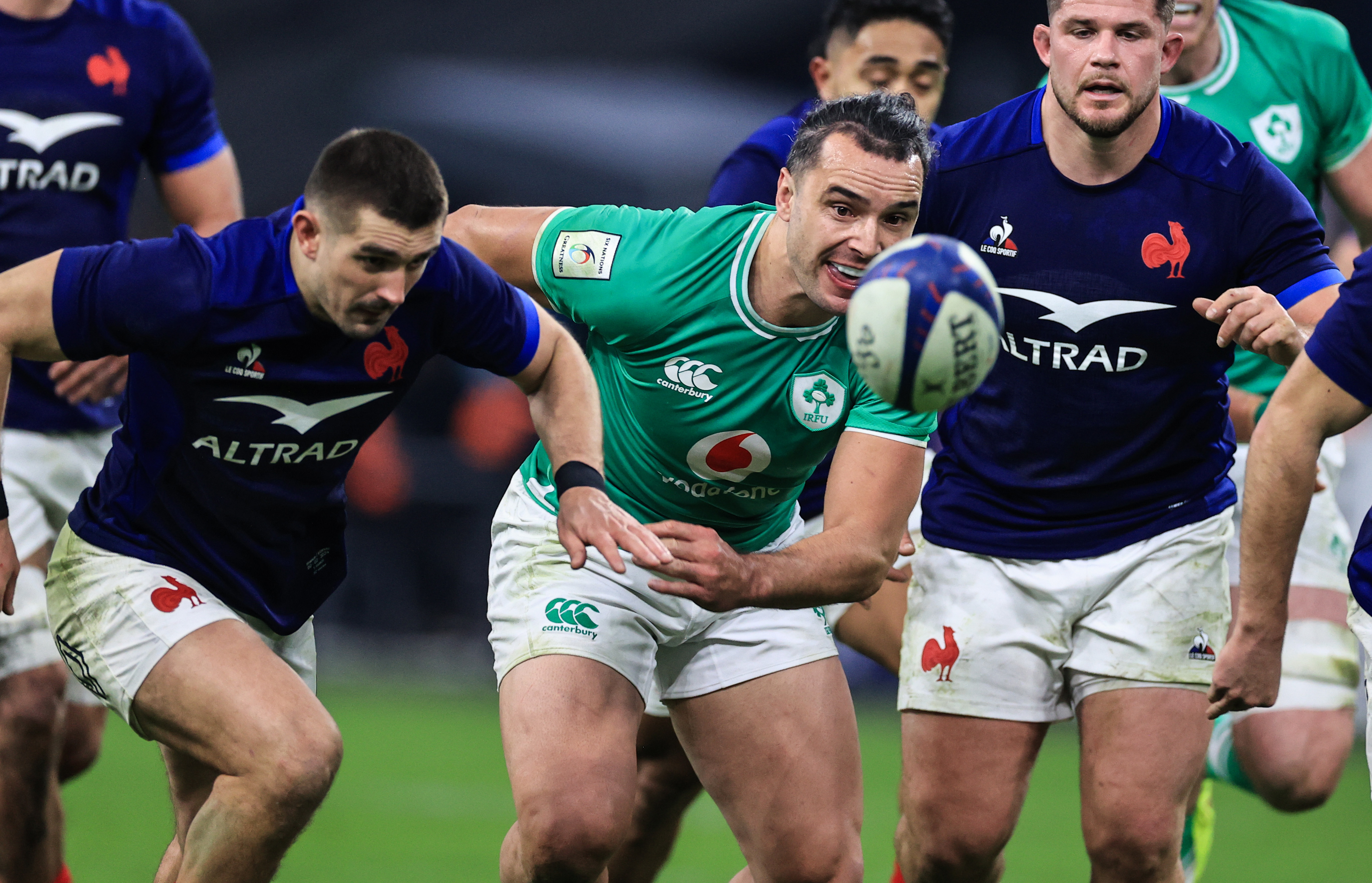 France's Thomas Ramos and Ireland's James Lowe chase the ball during the 2024 Guinness Men's Six Nations match at Orange Vélodrome, Marseille,