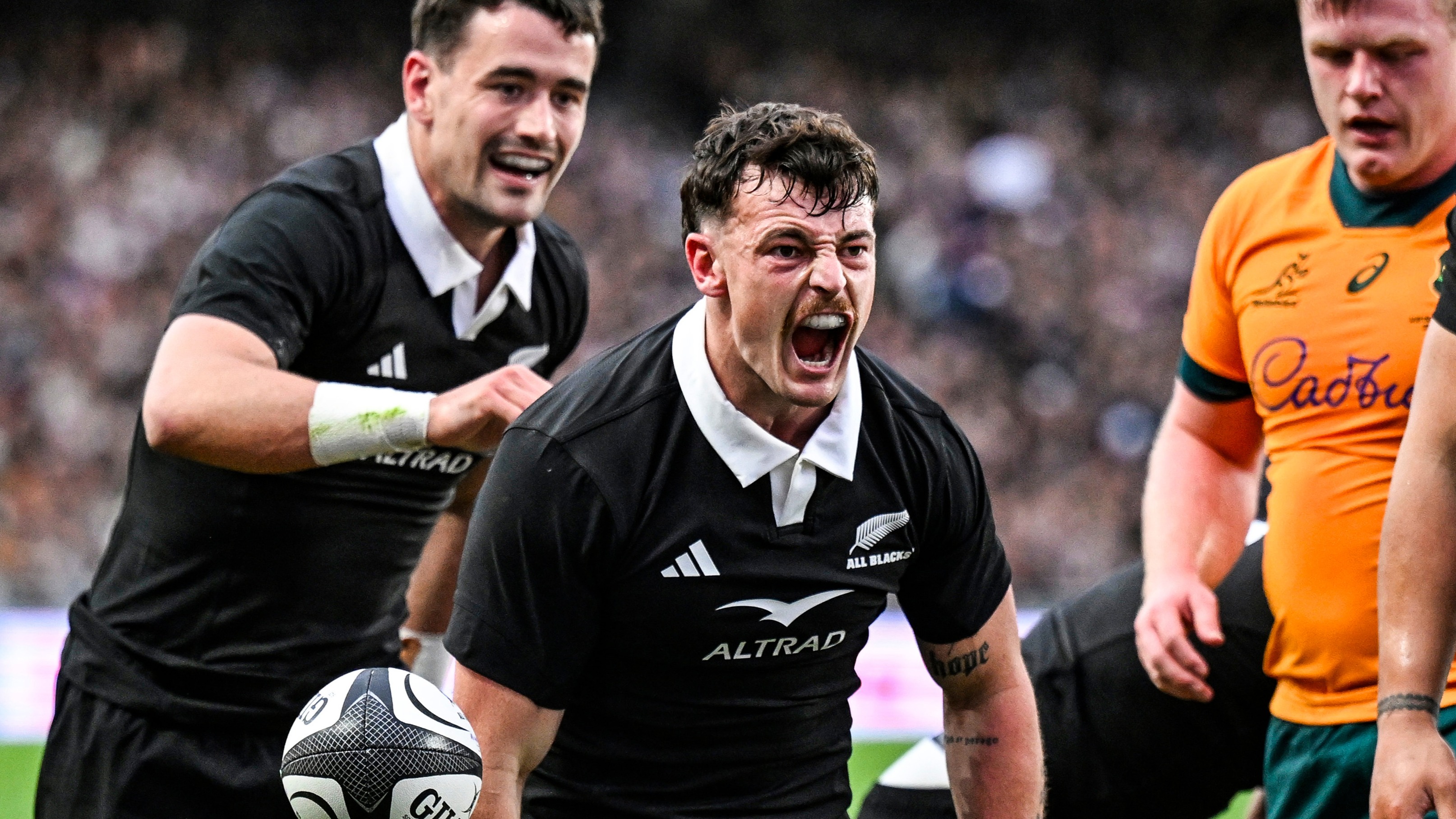 New Zealand's Leroy Carter celebrates his try against Australia in 2025.