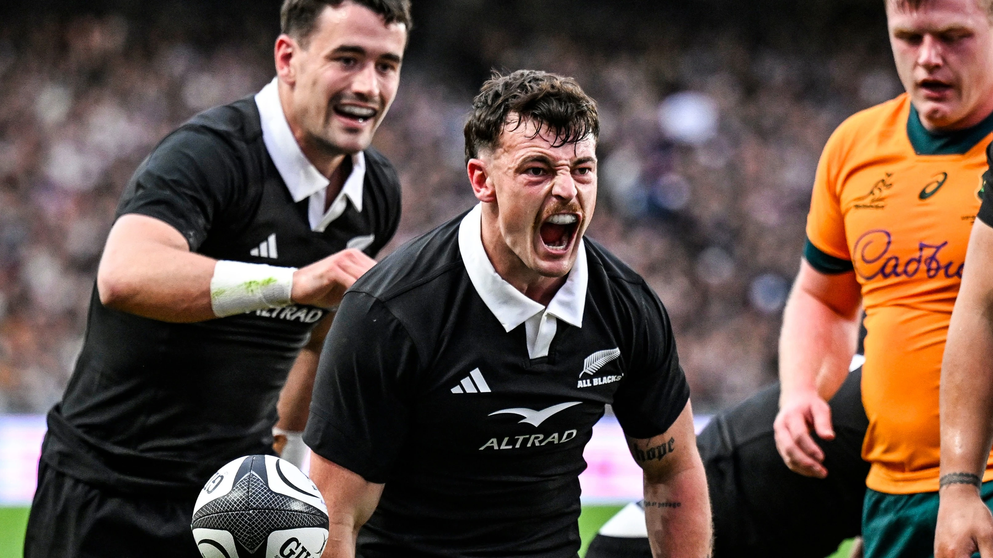 New Zealand's Leroy Carter celebrates his try against Australia in 2025.