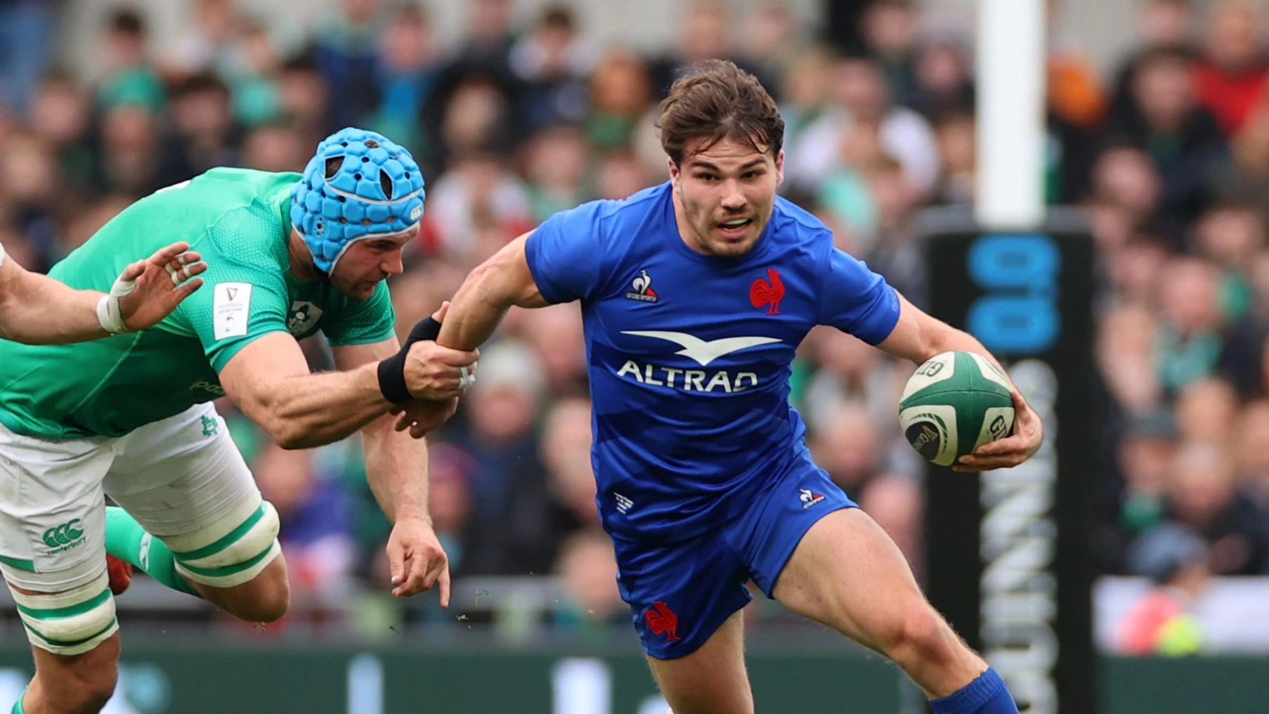 France's Antoine Dupont followed by Josh van der Flier and James Ryan of Ireland