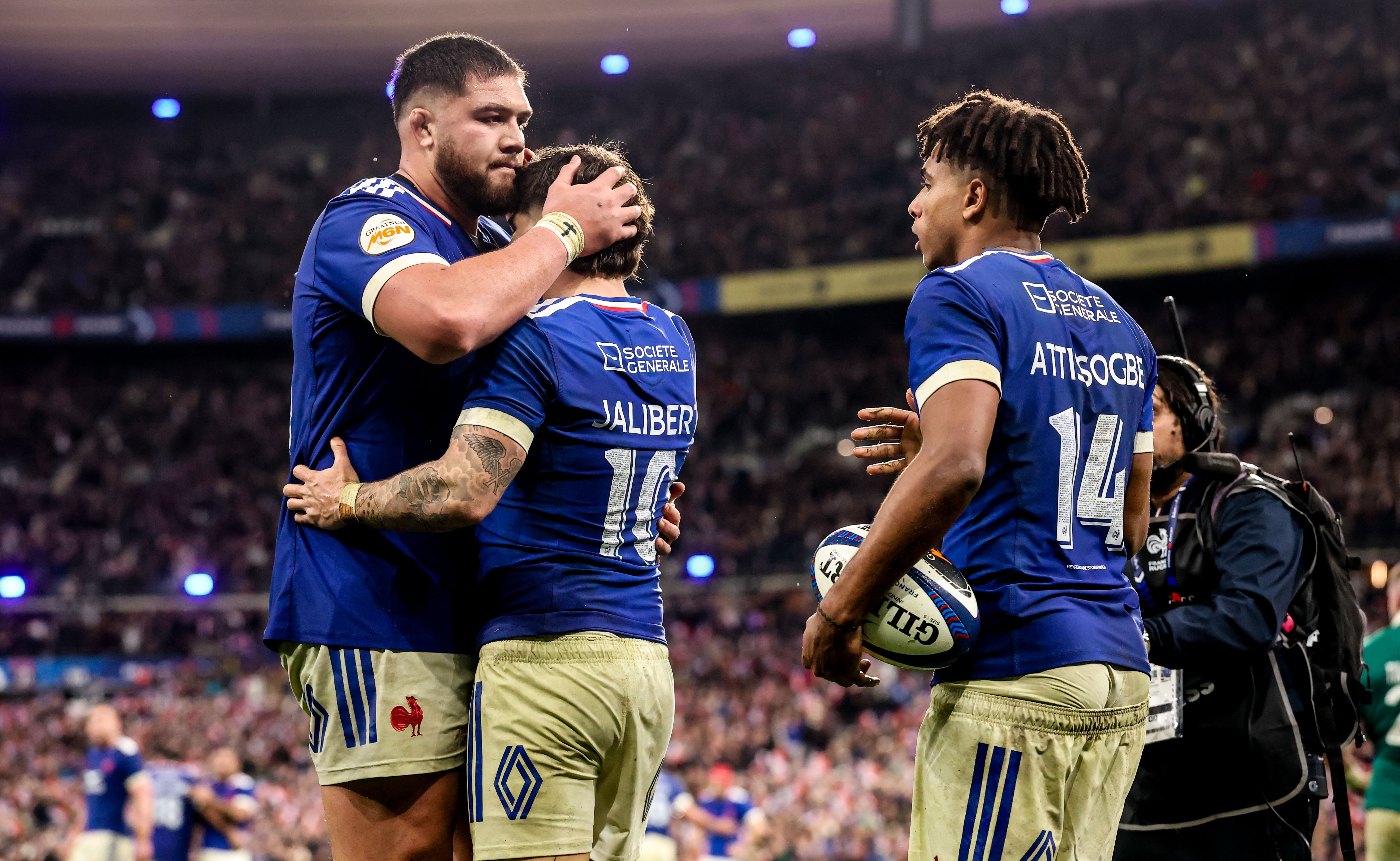 France's Theo Attissogbe celebrates with Emmanuel Meafou and Matthieu Jalibert after scoring his sides fifth try of the match during the 2026 Guinness Six Nations Championship Round 1 game between France and Ireland in Stade de France, Paris, France, Thursday, February 5, 2026 (Photo by Nick Elliott / Inpho)