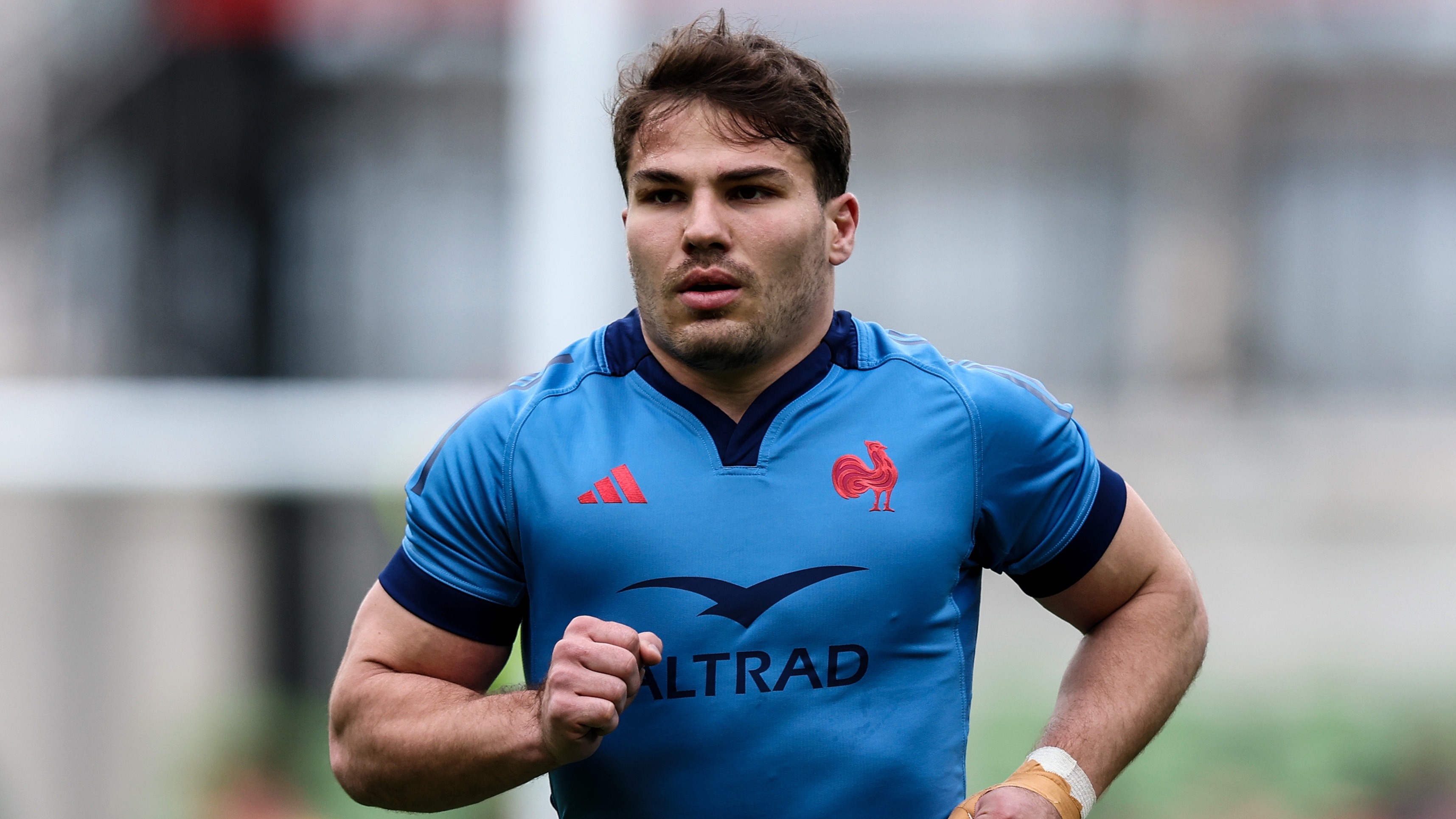 France's Antoine Dupont warms up ahead of the 2025 Guinness Men's Six Nations match against Ireland in Dublin.