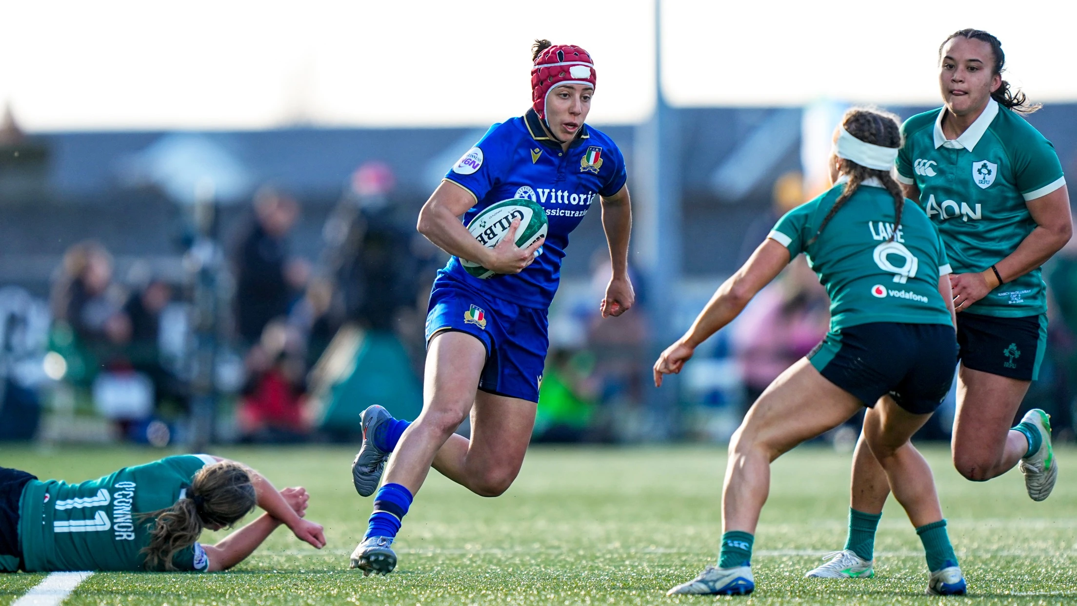 Vittoria Ostuni Minuzzi of Italy breaks the tackle of Robyn O'Connor of Ireland during the 2026 Guinness Women's Six Nations Championship Round 2 game between Ireland and Italy in Dexcom Stadium, Galway