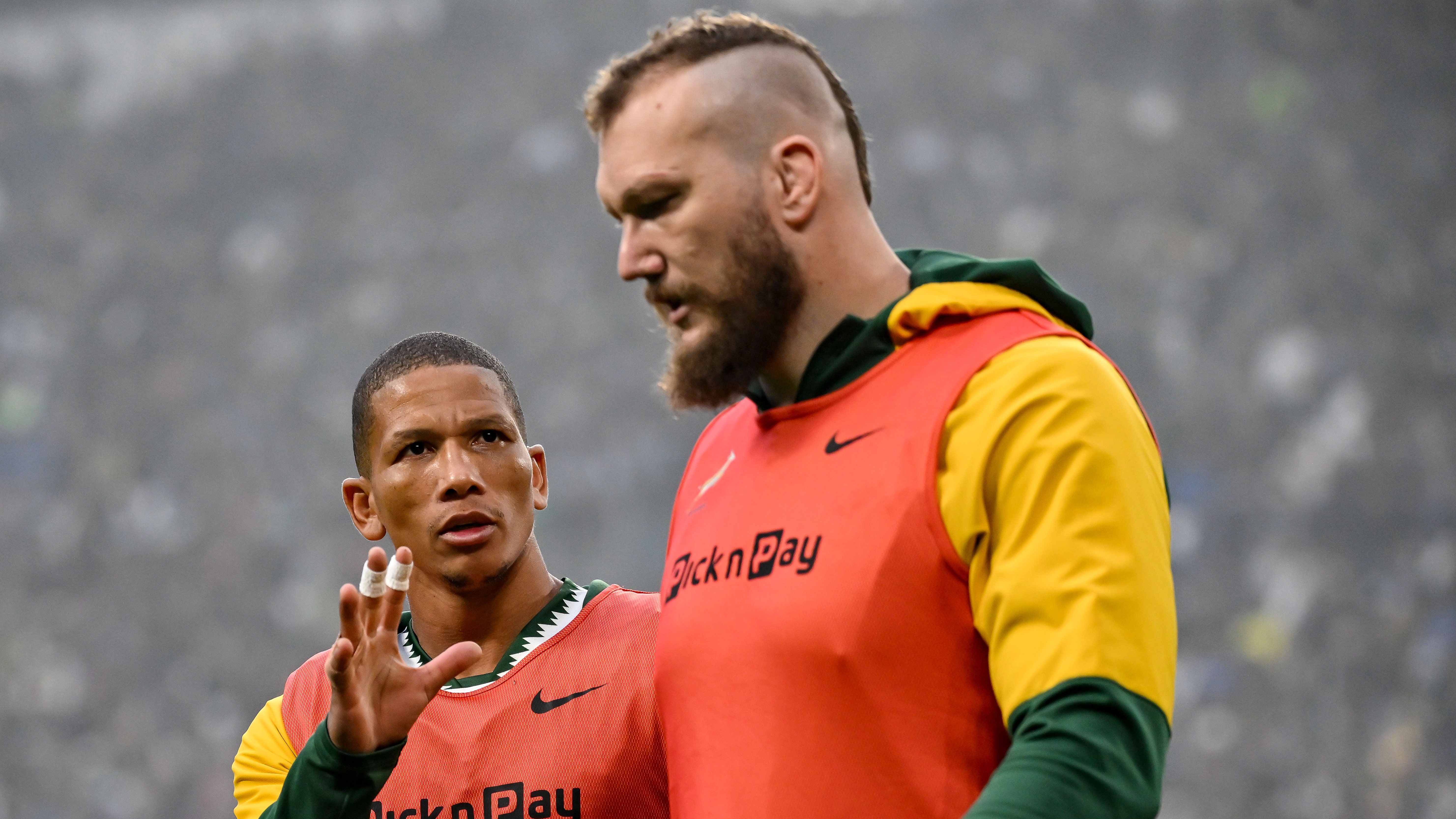 South Africa's Manie Libbok and RG Snyman chat during the 2025 Quilter Nations Series match in Italy.