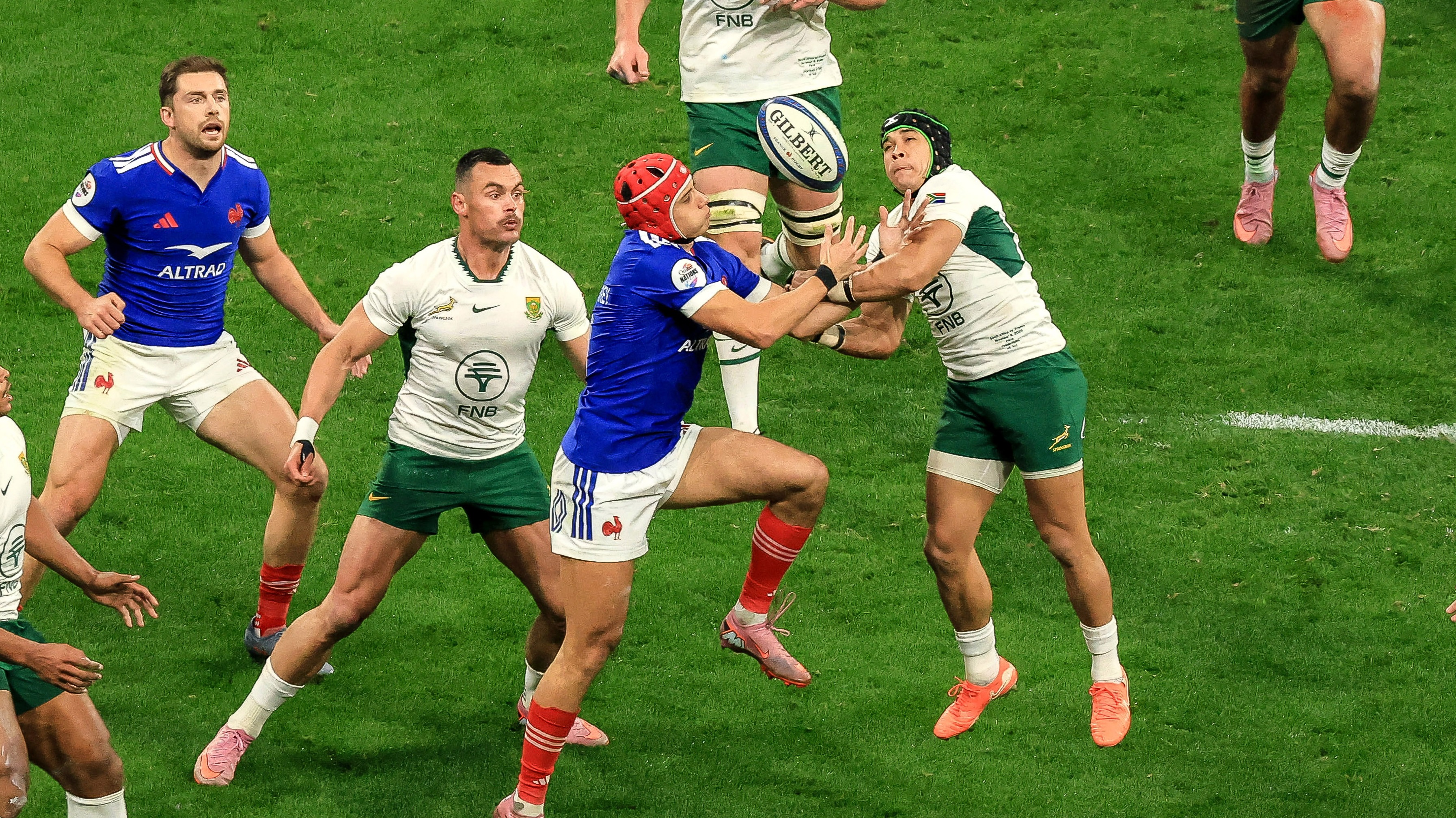 Louis Bielle-Biarrey and Cheslin Kolbe compete for the high ball during the 2025 Quilter Nations Series game between France and South Africa. 