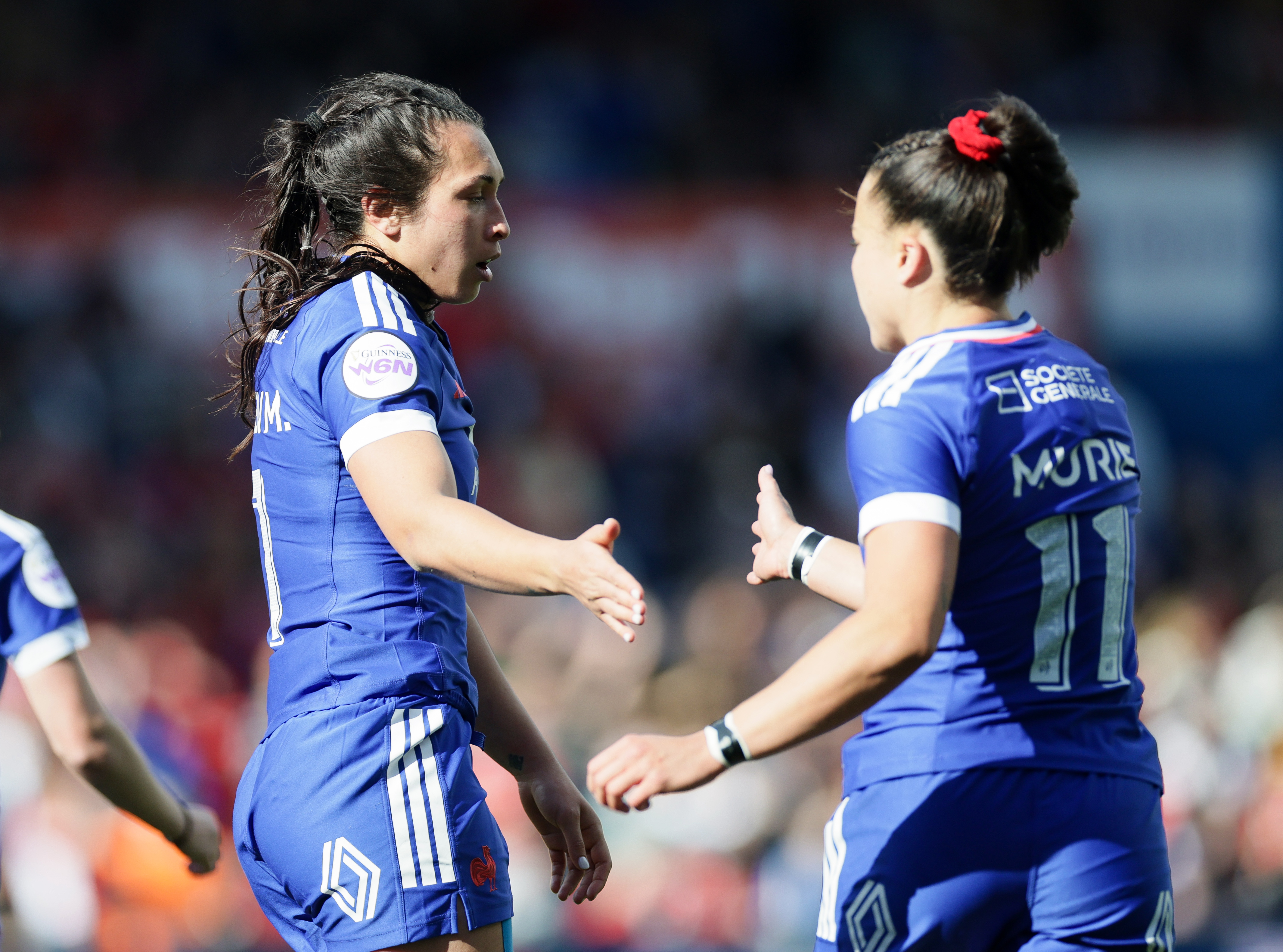 France's Manae Feleu celebrates with Lea Muire after she scores her sides 2nd try of the match during the 2026 Guinness Women's Six Nations Championship Round 2 game between Wales and France in Cardiff Arms Park, Cardiff, Wales, Saturday, April 18, 2026 (Photo by Laszlo Geczo / Inpho).