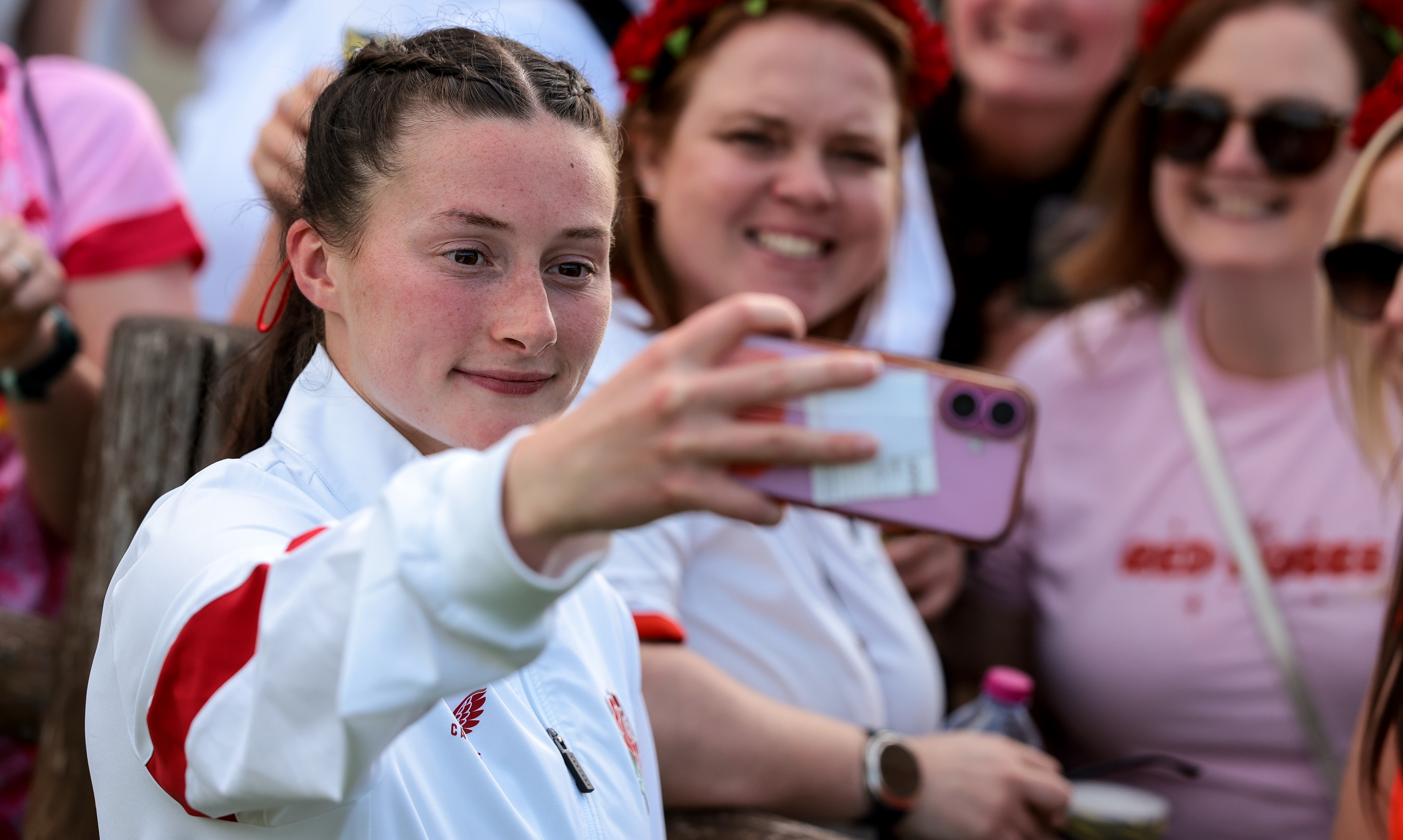 England's Lucy Packer takes a selfie with fans after the 2026 Guinness Women's Six Nations Championship Round 4 game between Italy and England in Stadio Sergio Lanfranchi, Parma