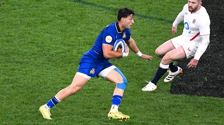 Lorenzo Pani looks to evade the oncoming Elliot Daly during Italy's round four match against England in the 2026 Championship.