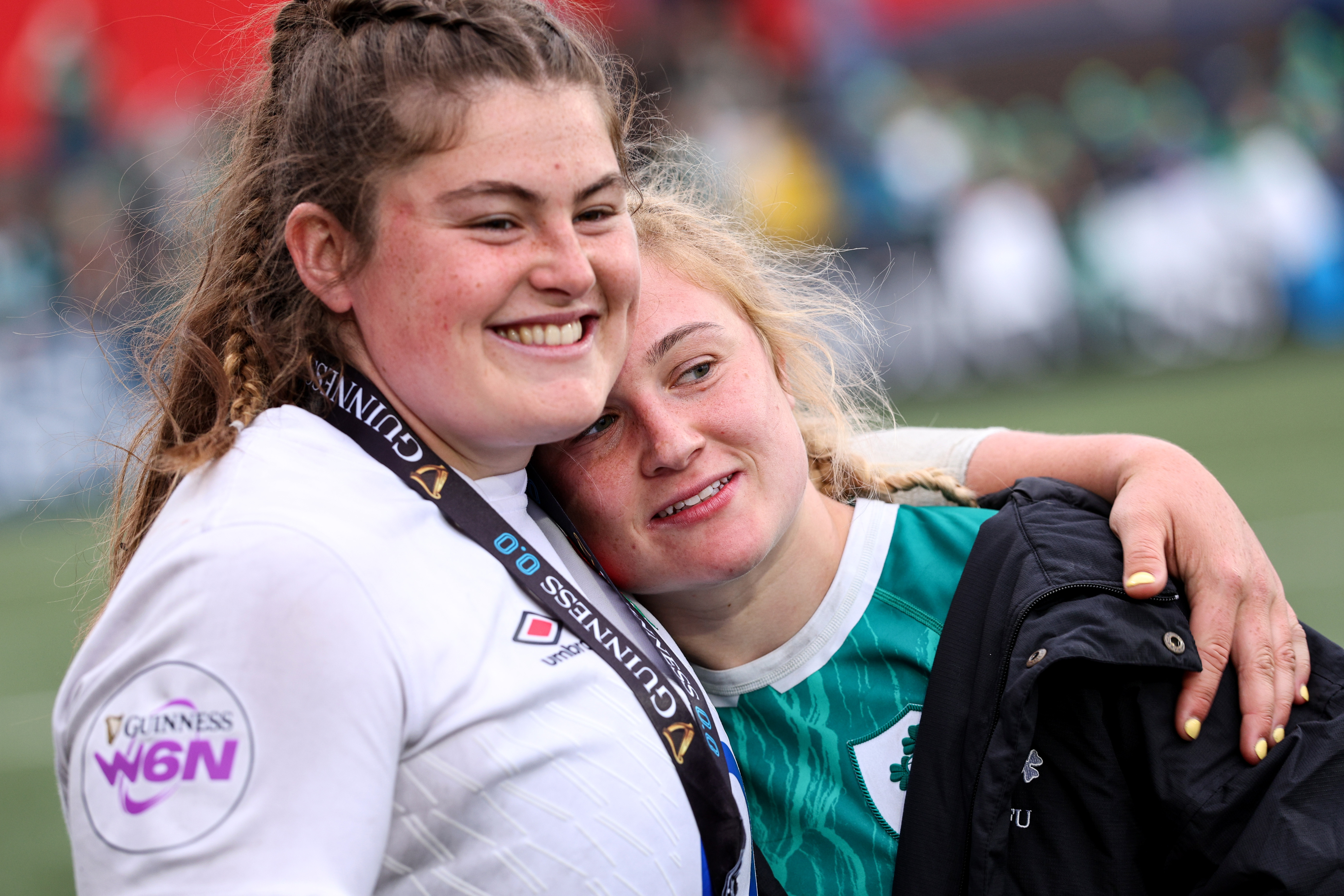 England's Maud Muir shares a hug with Neve Jones of Ireland after the 2025 Guinness Women's Six Nations Championship Round 3 game between Ireland and England