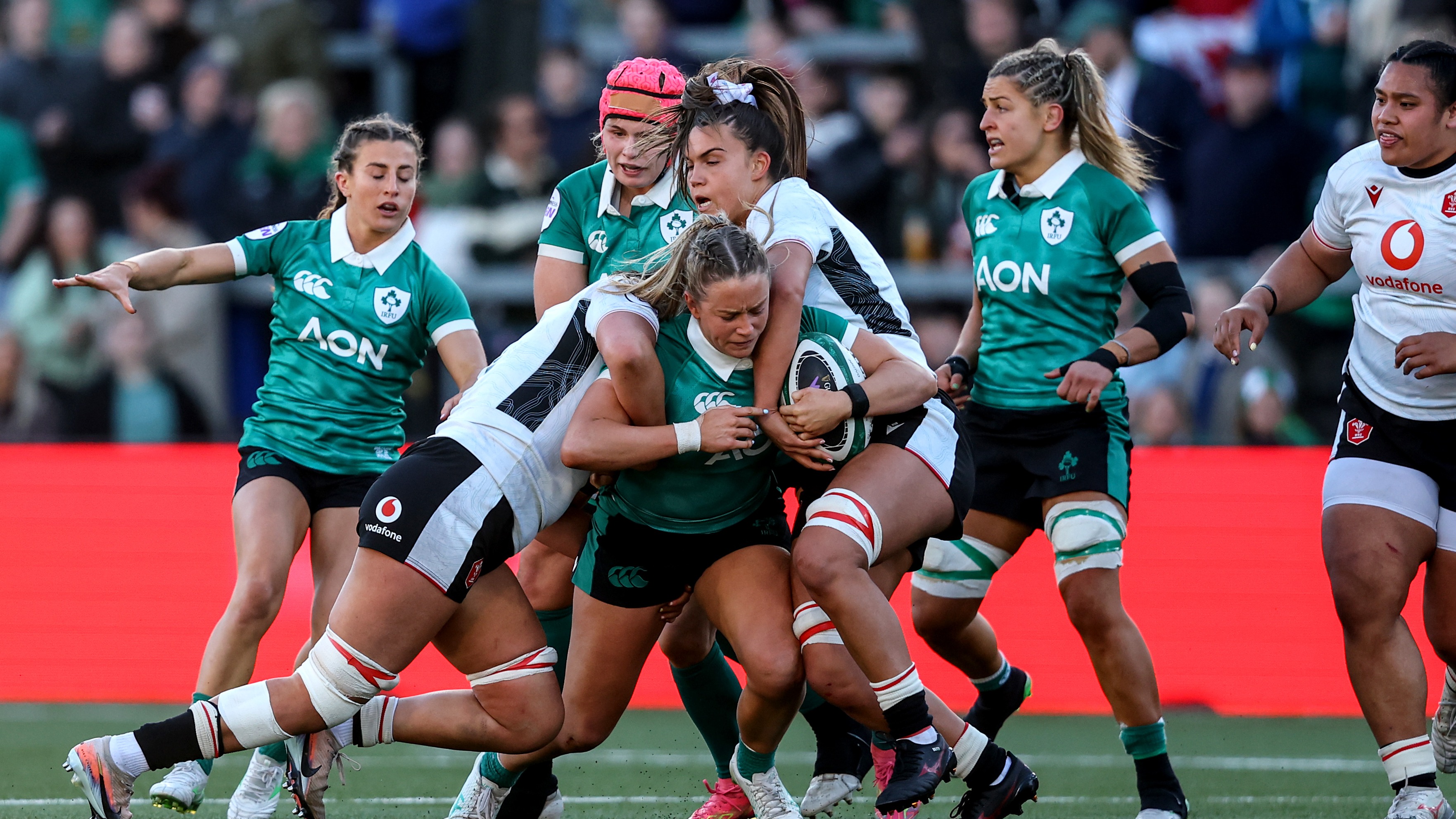 Ireland's Stacey Flood is tackled during the 2026 Guinness Women's Six Nations Championship Round 4 game against Wales in Affidea Stadium, Belfast.