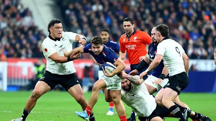France's Antoine Dupont is tackled by New Zealand's Tamaiti Williams during the Autumn Nations Series between France and New Zealand at Stade de France, Paris