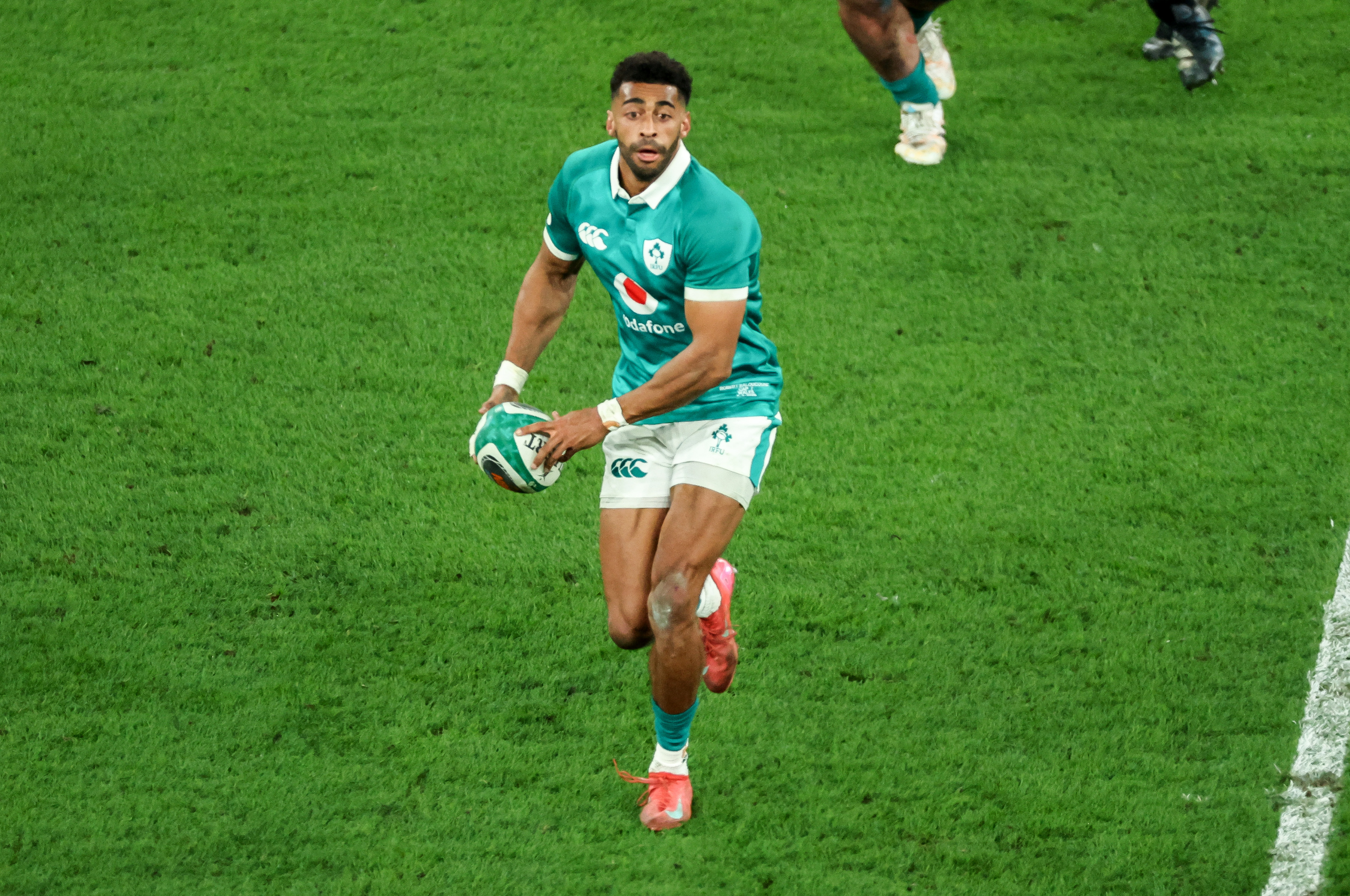 Robert Baloucoune looks to move the ball away against Wales during the 2026 Championship.