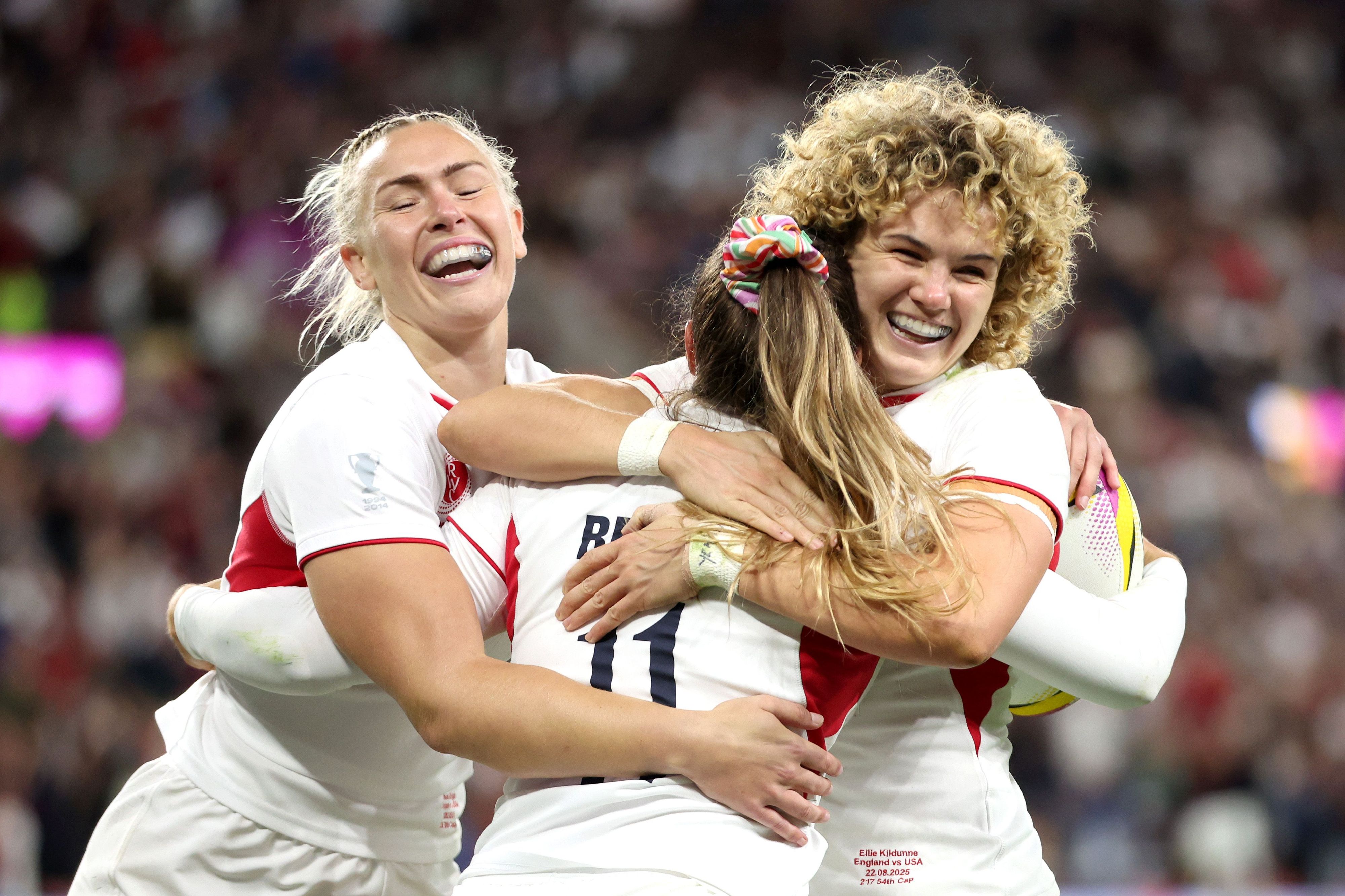 Red Roses players celebrate after a try against USA in the opening match of the 2024 World Cup.