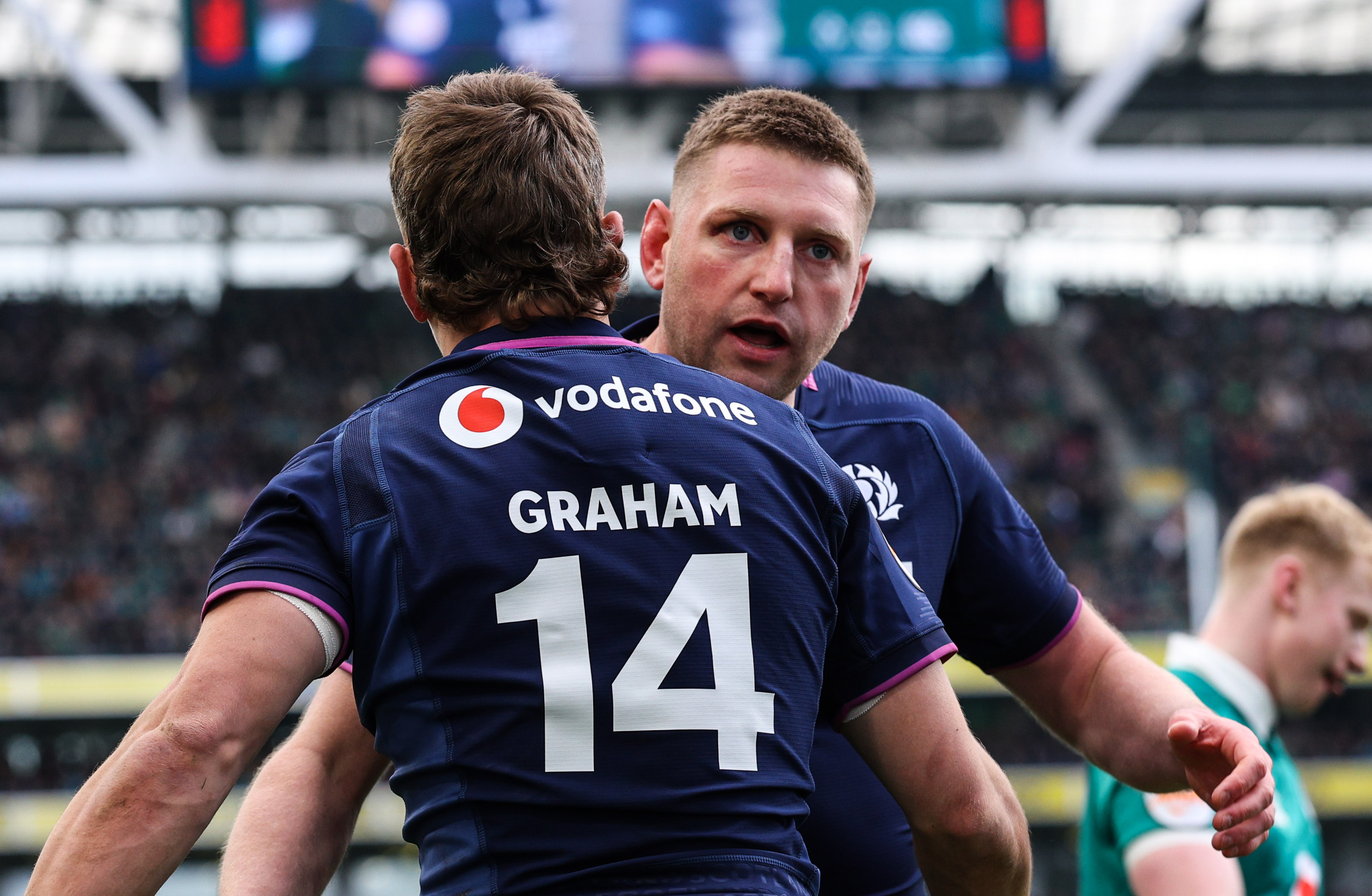 Scotland’s Darcy Graham celebrates scoring their first try with Finn Russell during the 2026 Guinness Six Nations Championship Round 5 game between Ireland and Scotland in the Aviva Stadium, Dublin,