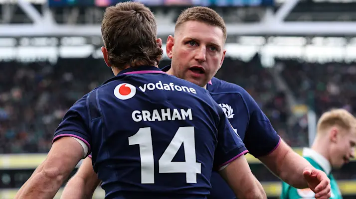 Scotland’s Darcy Graham celebrates scoring their first try with Finn Russell during the 2026 Guinness Six Nations Championship Round 5 game between Ireland and Scotland in the Aviva Stadium, Dublin,