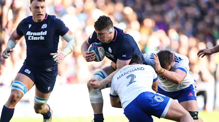 Scotland's Rory Darge is tackled by France’s Julien Marchand during the 2026 Guinness Men's Six Nations match in Edinburgh.
