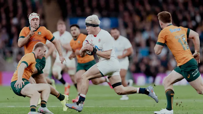 Henry Pollock runs at at Wallabies player during the 2025 Quilter Nations Series.