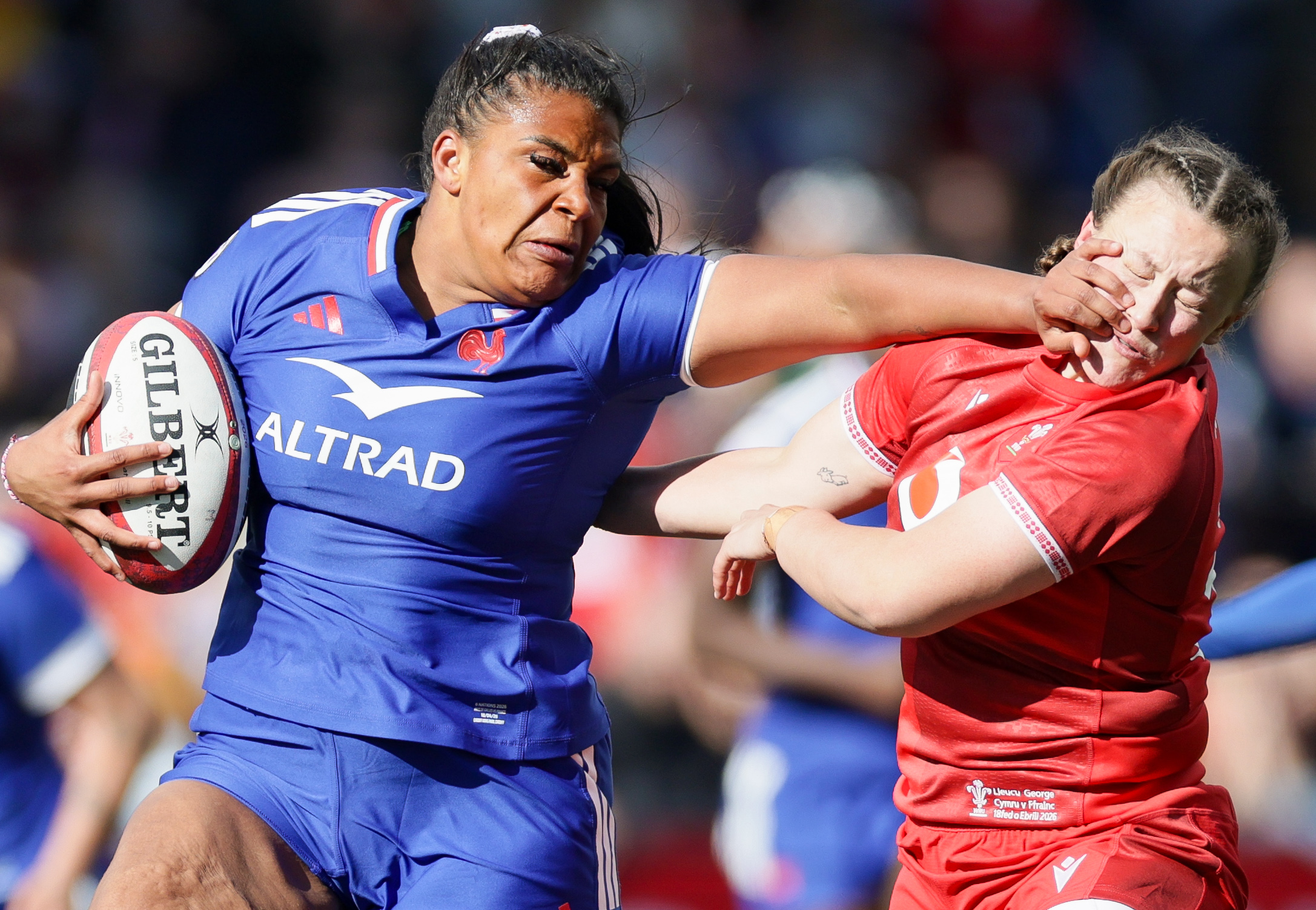 France's Ambre Mwayembe hands off Wales' Lleucu George during the 2026 Guinness Women's Six Nations Championship
