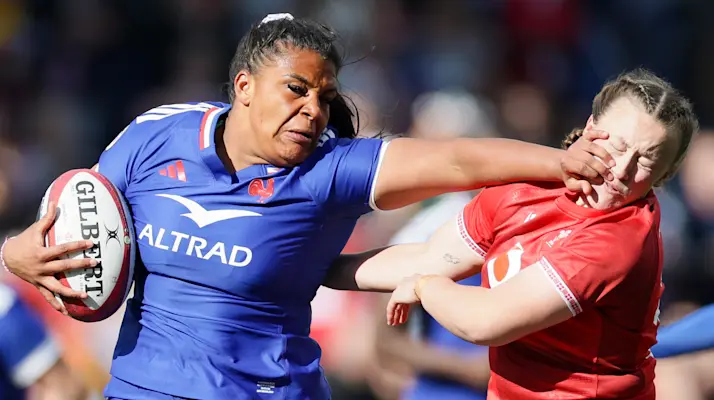 France's Ambre Mwayembe hands off Wales' Lleucu George during the 2026 Guinness Women's Six Nations Championship