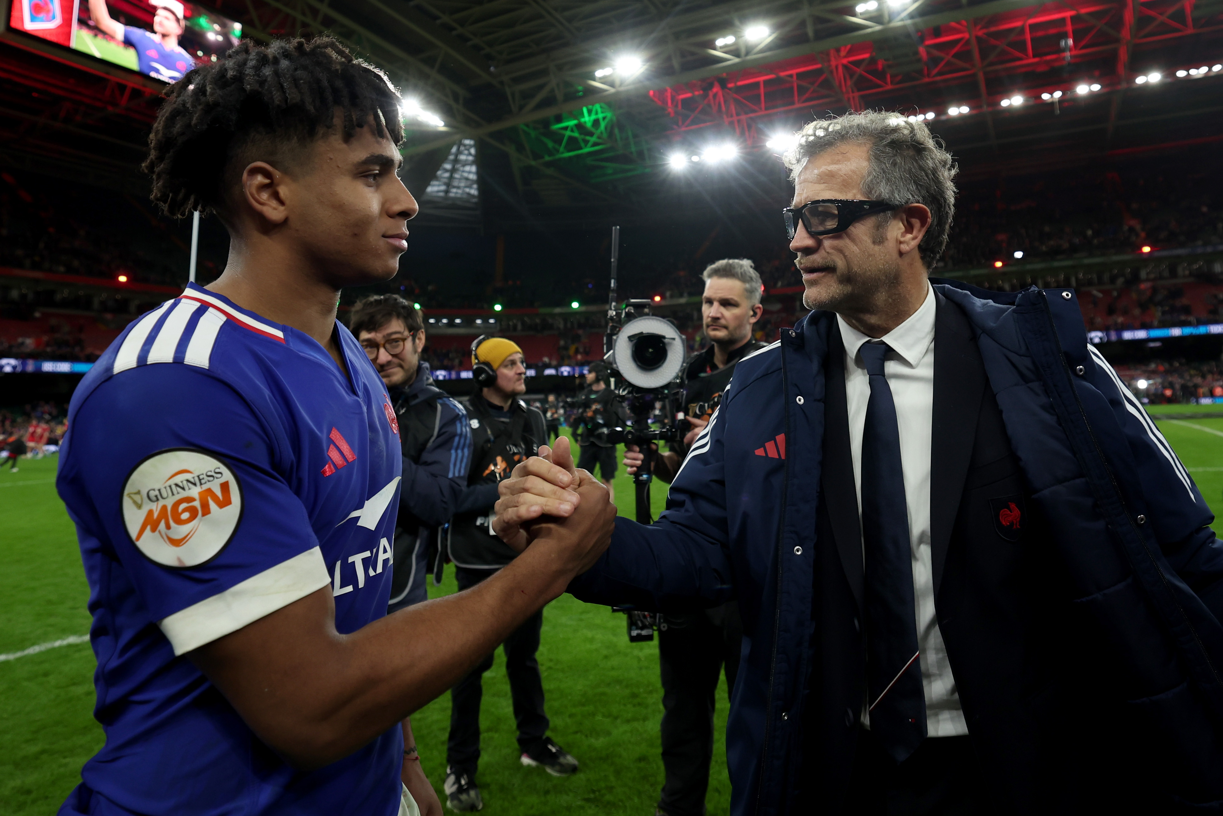 France's Theo Attissogbe celebrates with Head Coach Fabien Galthié after the 2026 Guinness Six Nations Championship Round 2 game between Wales and France in Principality Stadium, Cardiff, Wales, Saturday, February 15, 2026 (Photo by James Crombie / Inpho)