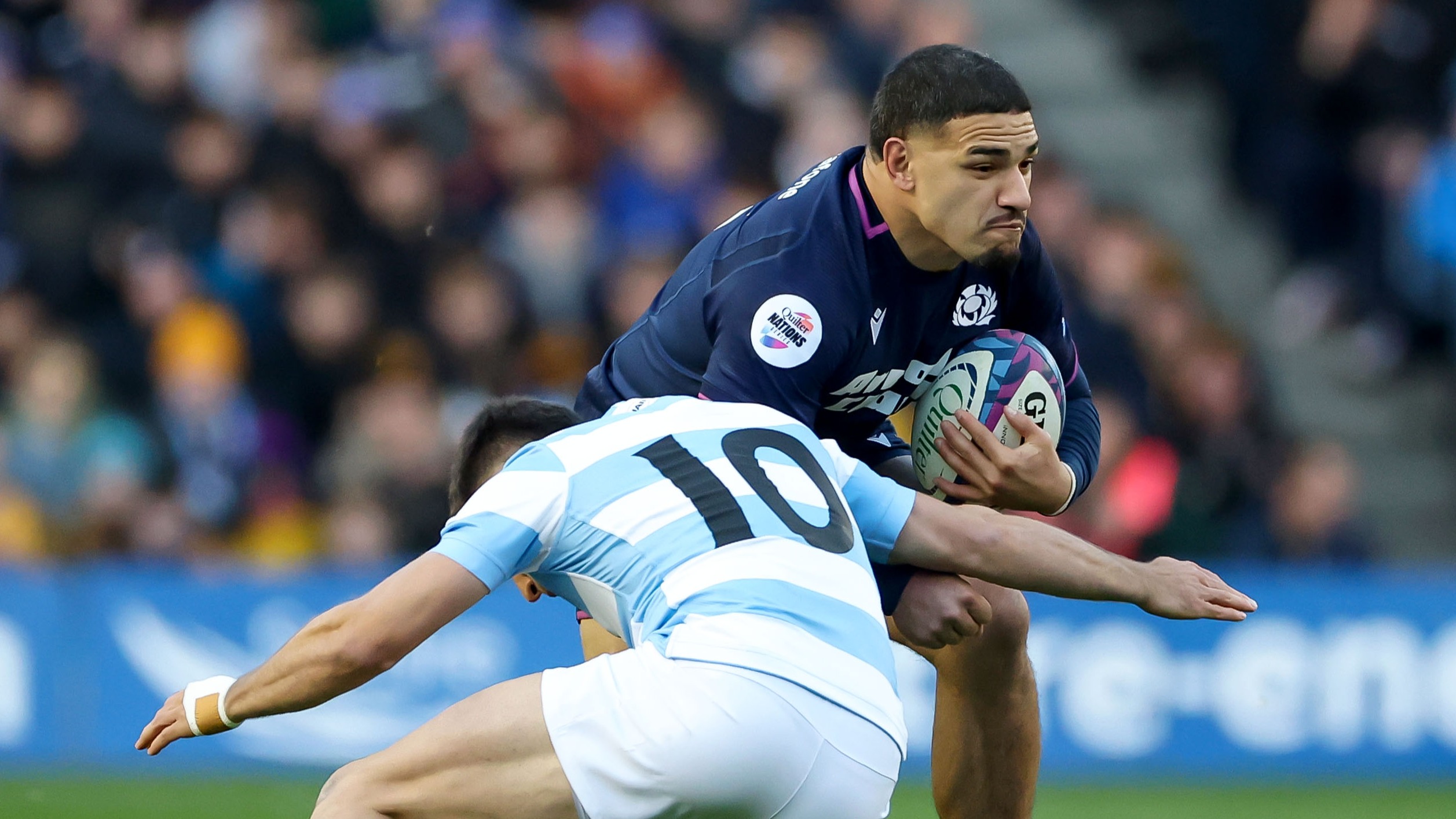 Scotland's Sione Tuipulotu is tackled by Argentina’s Gerónimo Prisciantelli during the 2025 Quilter Nations Series game between Scotland and Argentina in Scottish Gas Murrayfield, Edinburgh