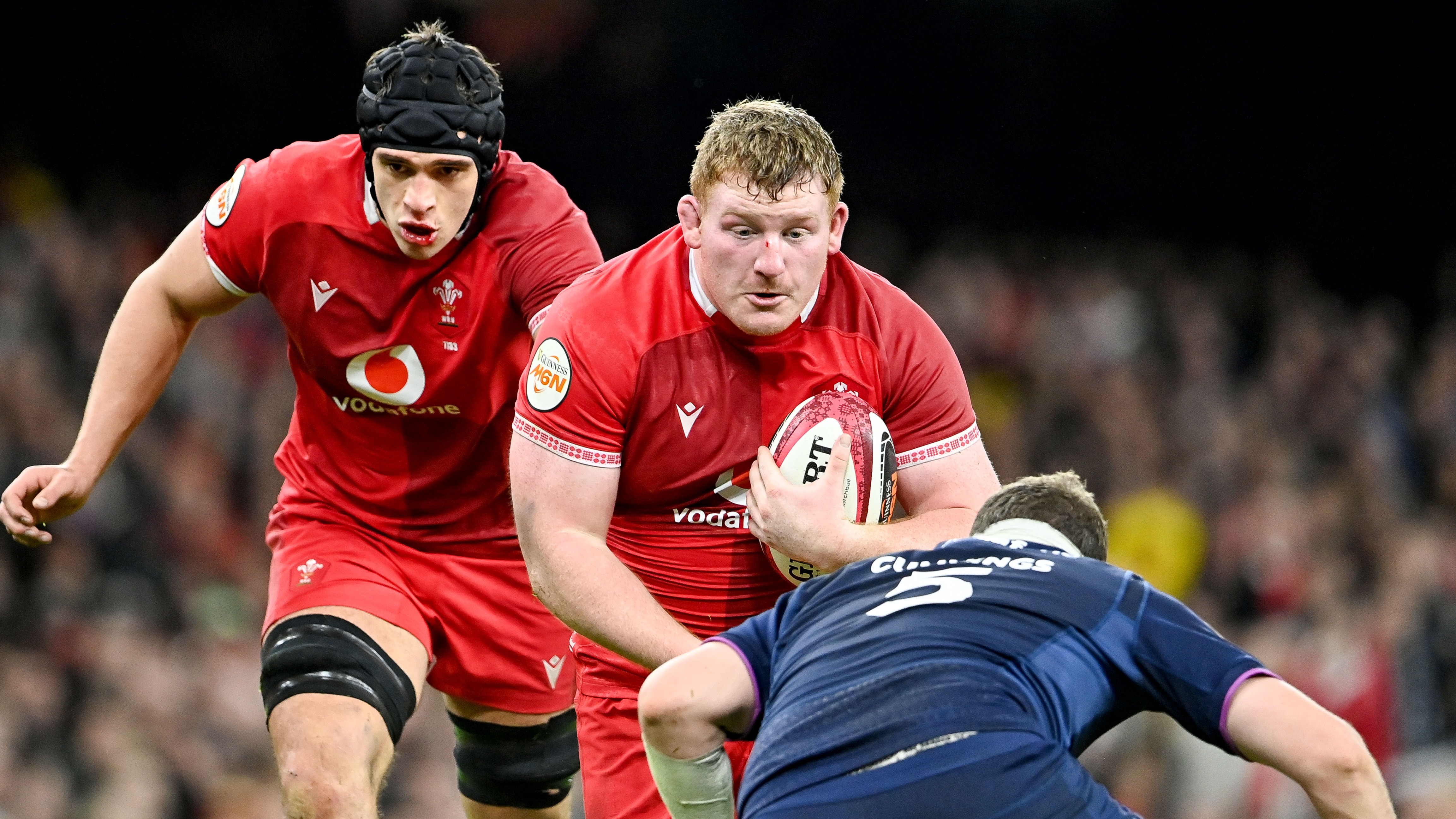 Rhys Carre carries the ball into contact against Scotland during round three of the 2026 Championship.