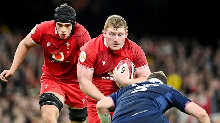 Rhys Carre carries the ball into contact against Scotland during round three of the 2026 Championship.