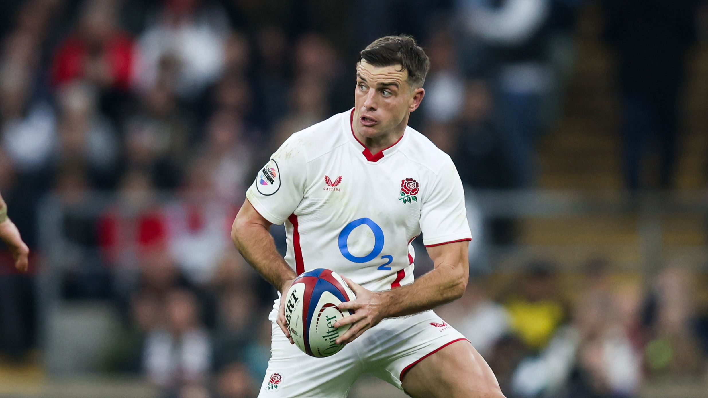 England's George Ford looks to move the ball away as New Zealand’s Scott Barrett closes in during the 2025 Quilter Nations Series.