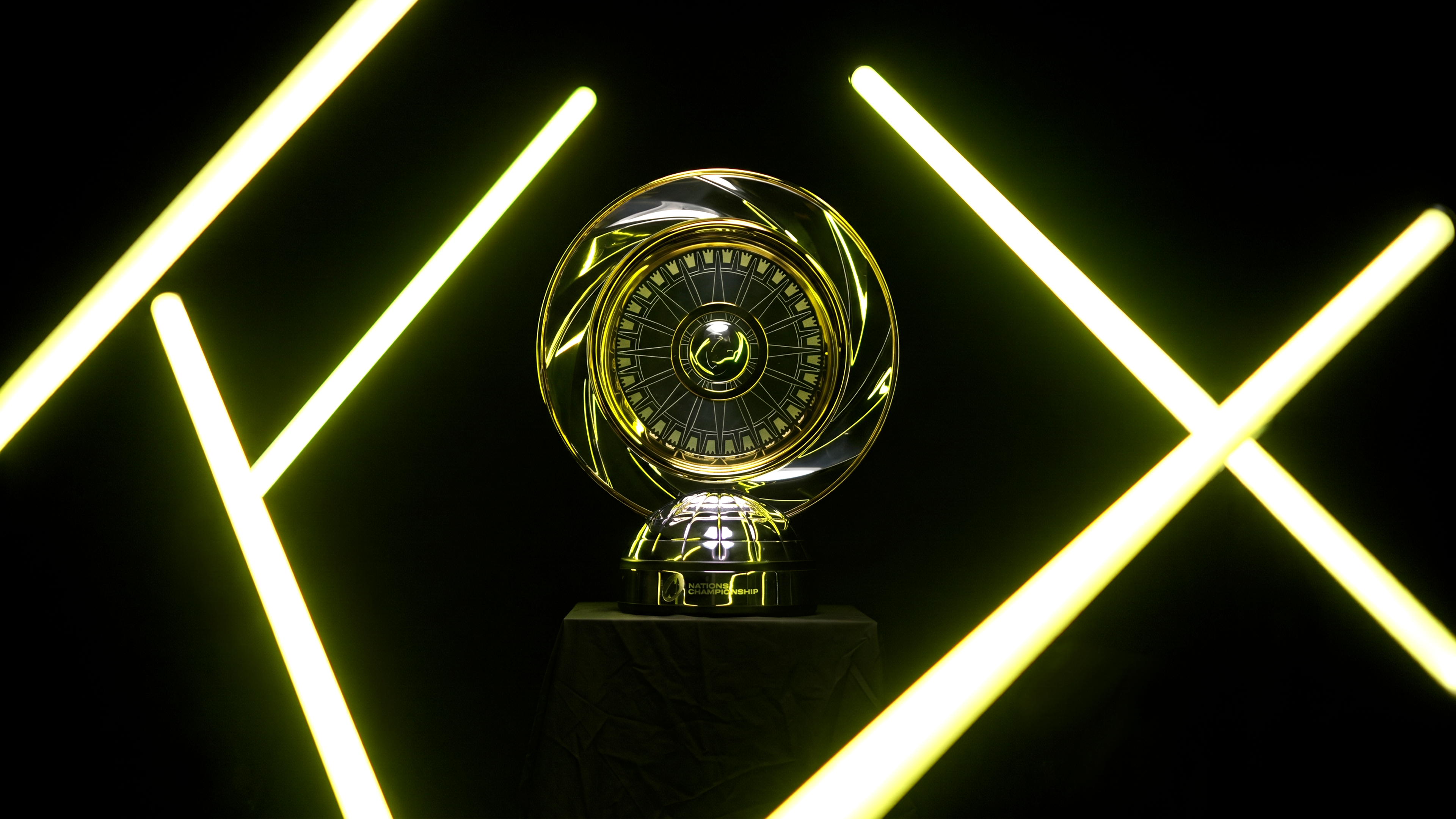 A view of the Hemisphere Shield set against a black backdrop with beams of neon light across it.