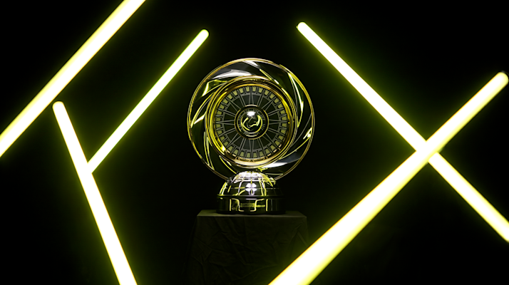 A view of the Hemisphere Shield set against a black backdrop with beams of neon light across it.