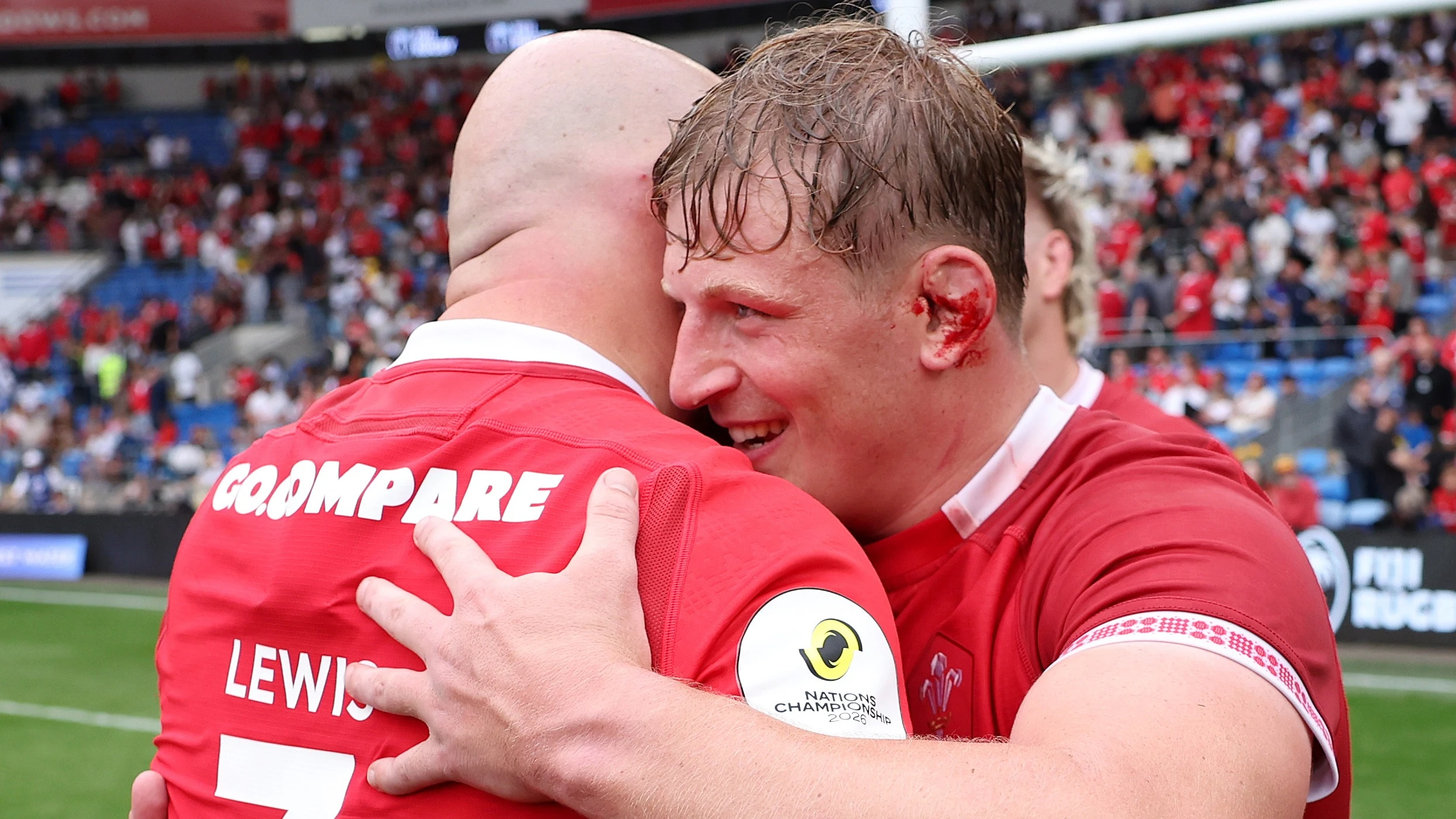 Jac Morgan and Dillon Lewis embrace after Wales' 2026 Nations Championship victory against Fiji in Cardiff City Stadium.