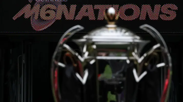 A view of the Men's Six Nations trophy in front of an LED board displaying the Guinness Men's Six Nations logo.