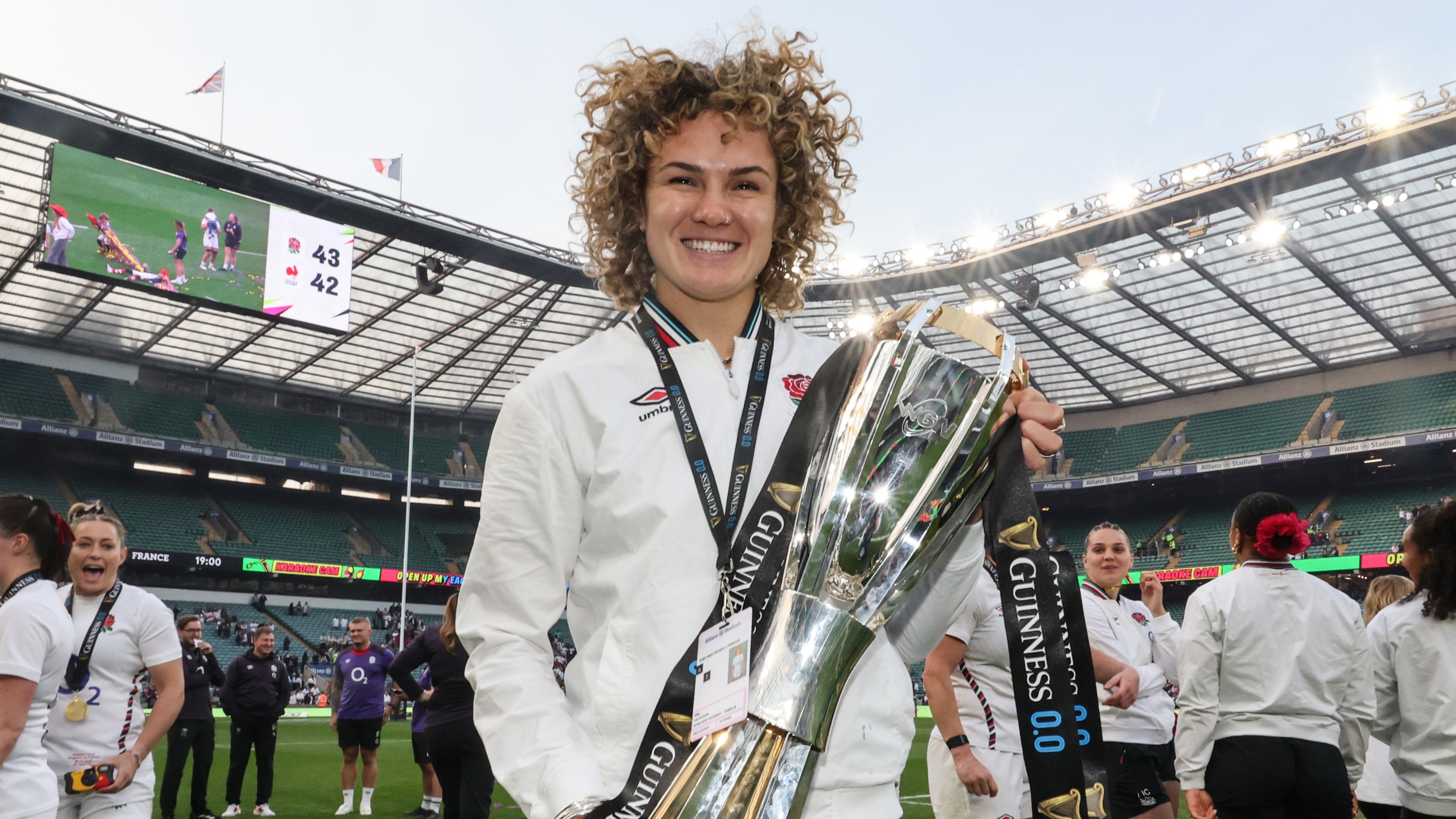 Ellie Kildunne with the Guinness Women's Six Nations trophy after completing the Grand Slam in 2025.