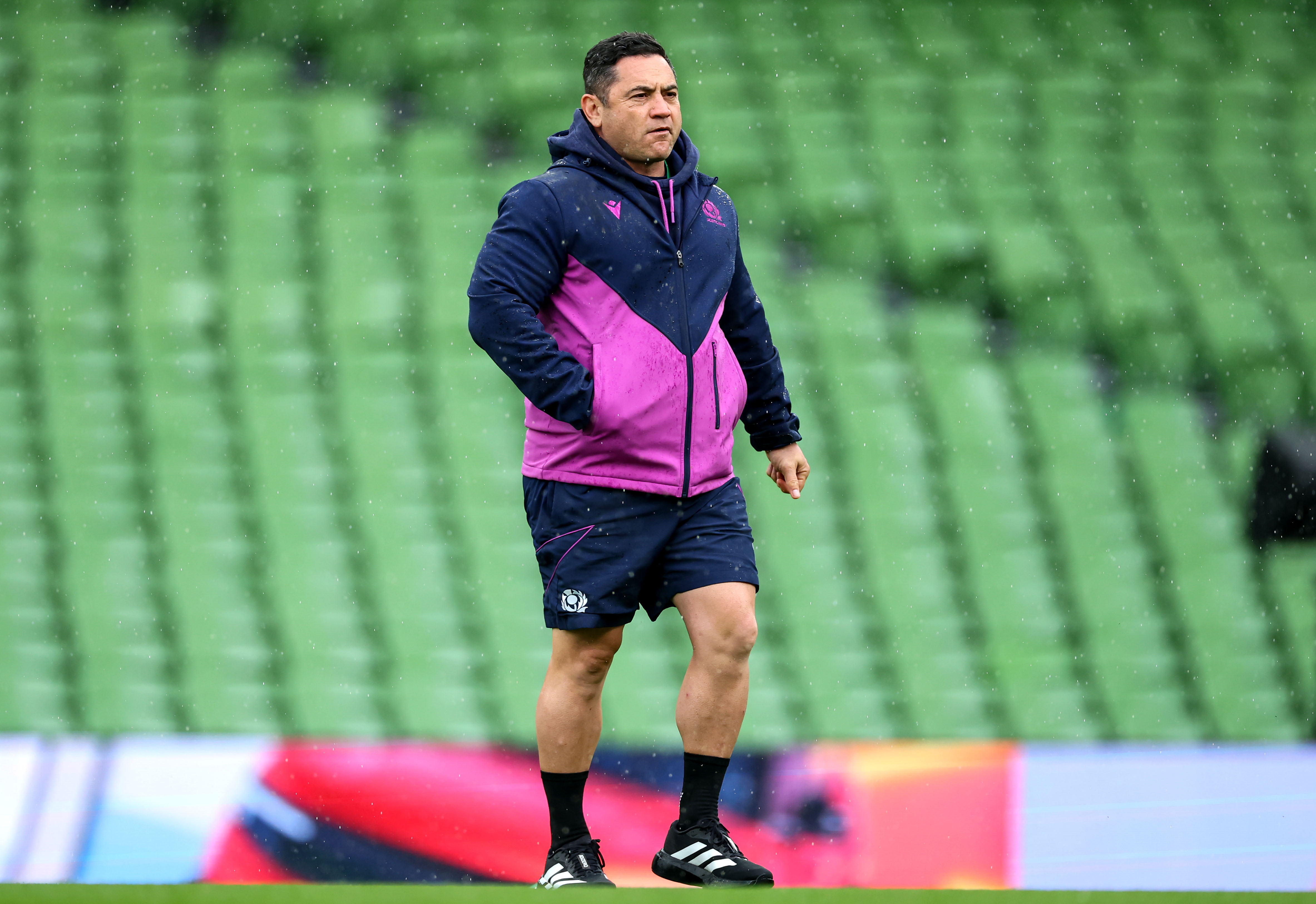 Scotland's Head Coach Sione Fukofuka inspects the pitch ahead of the 2026 Guinness Women's Six Nations Championship Round 5 game between Ireland and Scotland in Aviva Stadium, Dublin