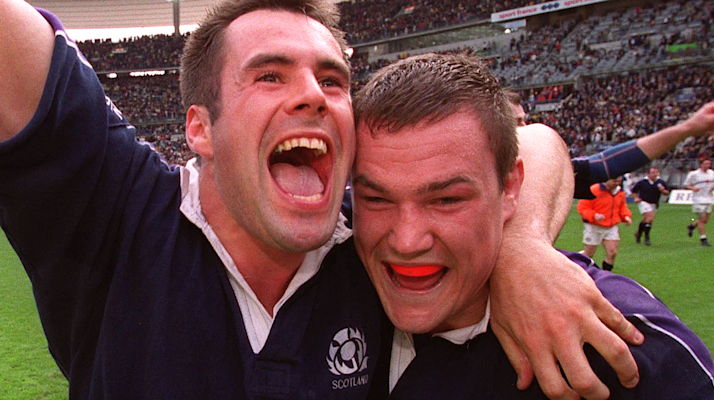 Kenny Logan and Gordon Bulloch celebrate beating France during the 1999 Five Nations.