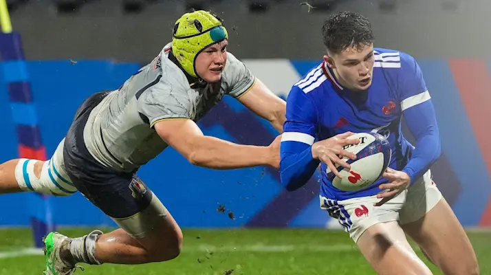 France's Axel Guillaud scores his side's second try of the match despite the attentions of Italy's Riccardo Casarin during the 2026 U20 Six Nations.