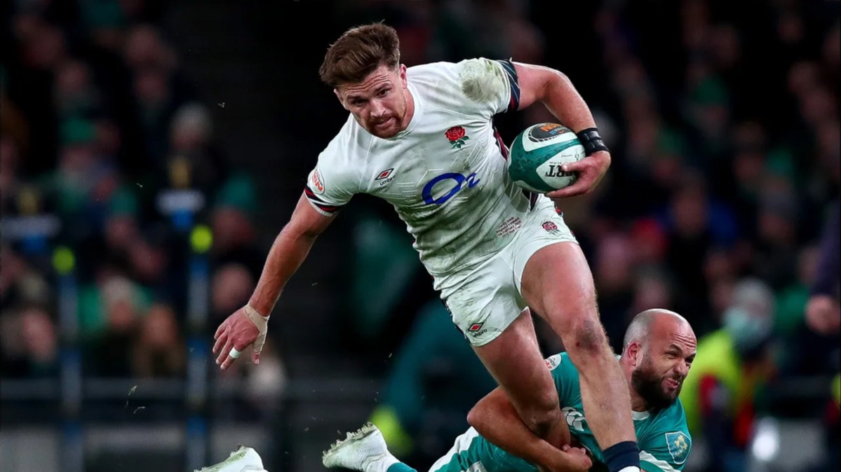 Henry Slade looks to evade Jamison Gibson-Park during the 2025 Six Nations match between England and Ireland.